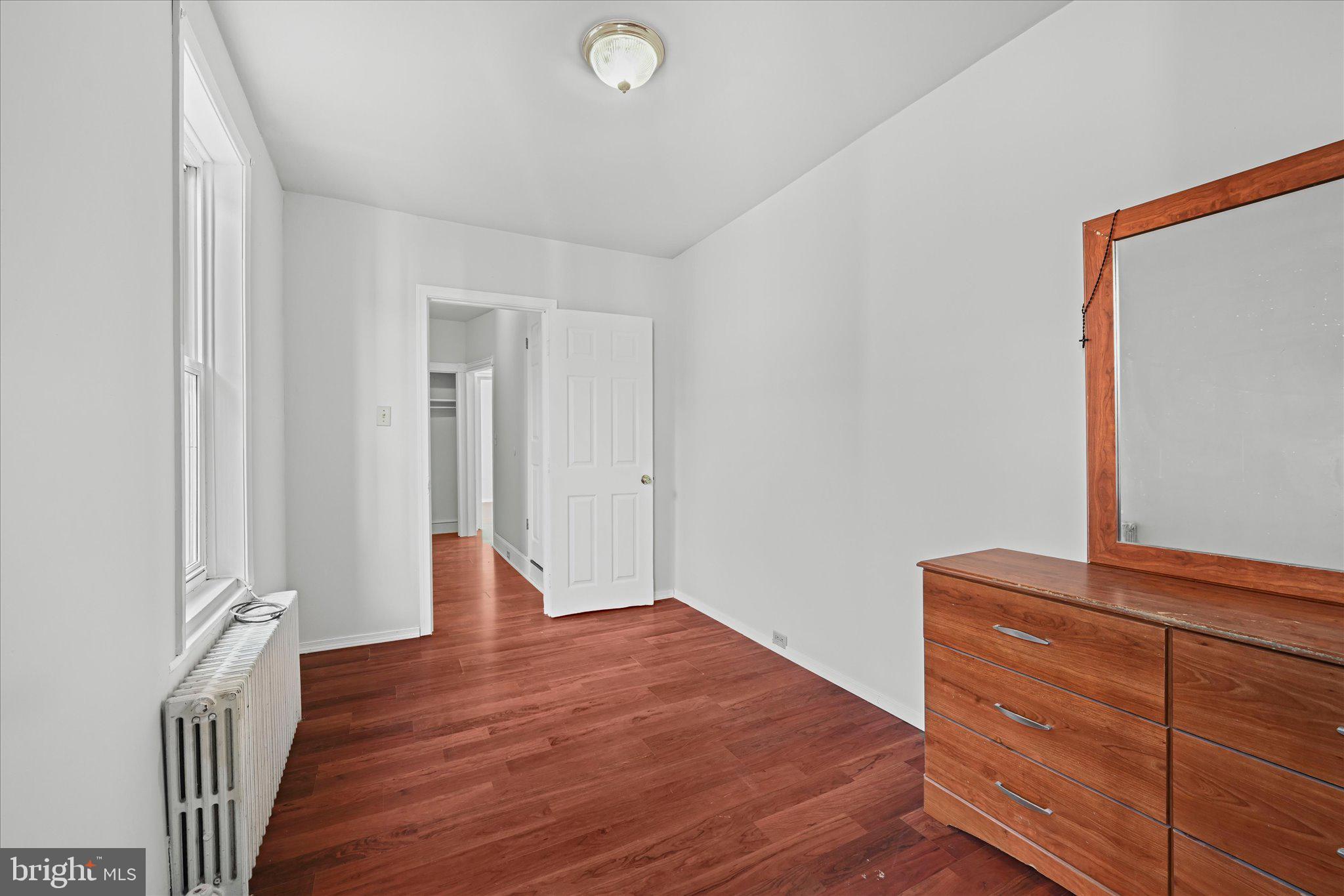 1042 Locust Street Reading, PA 19604 - Photo 19 of 28 a view of room with wooden floor