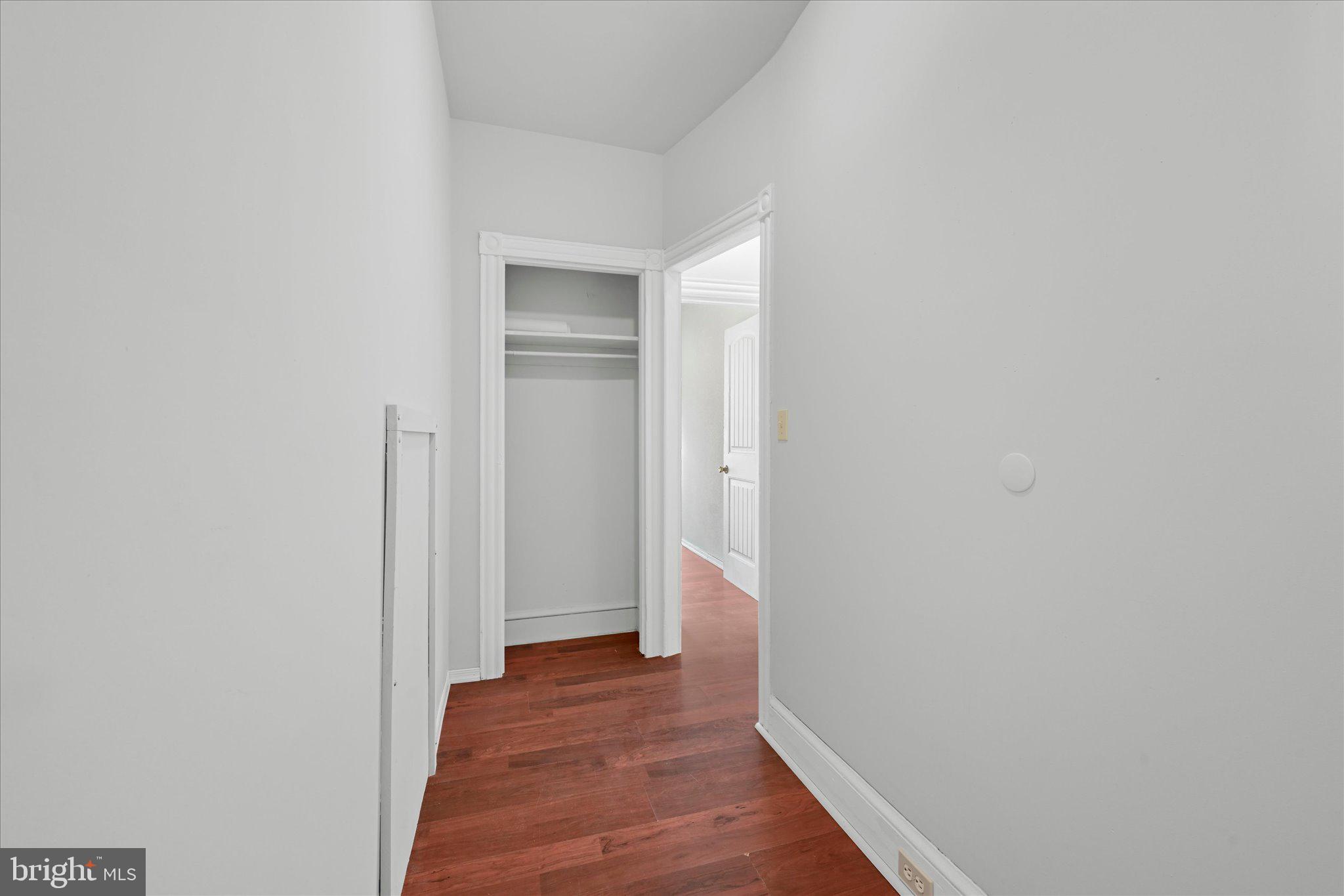 1042 Locust Street Reading, PA 19604 - Photo 20 of 28 a view of a hallway with wooden floor