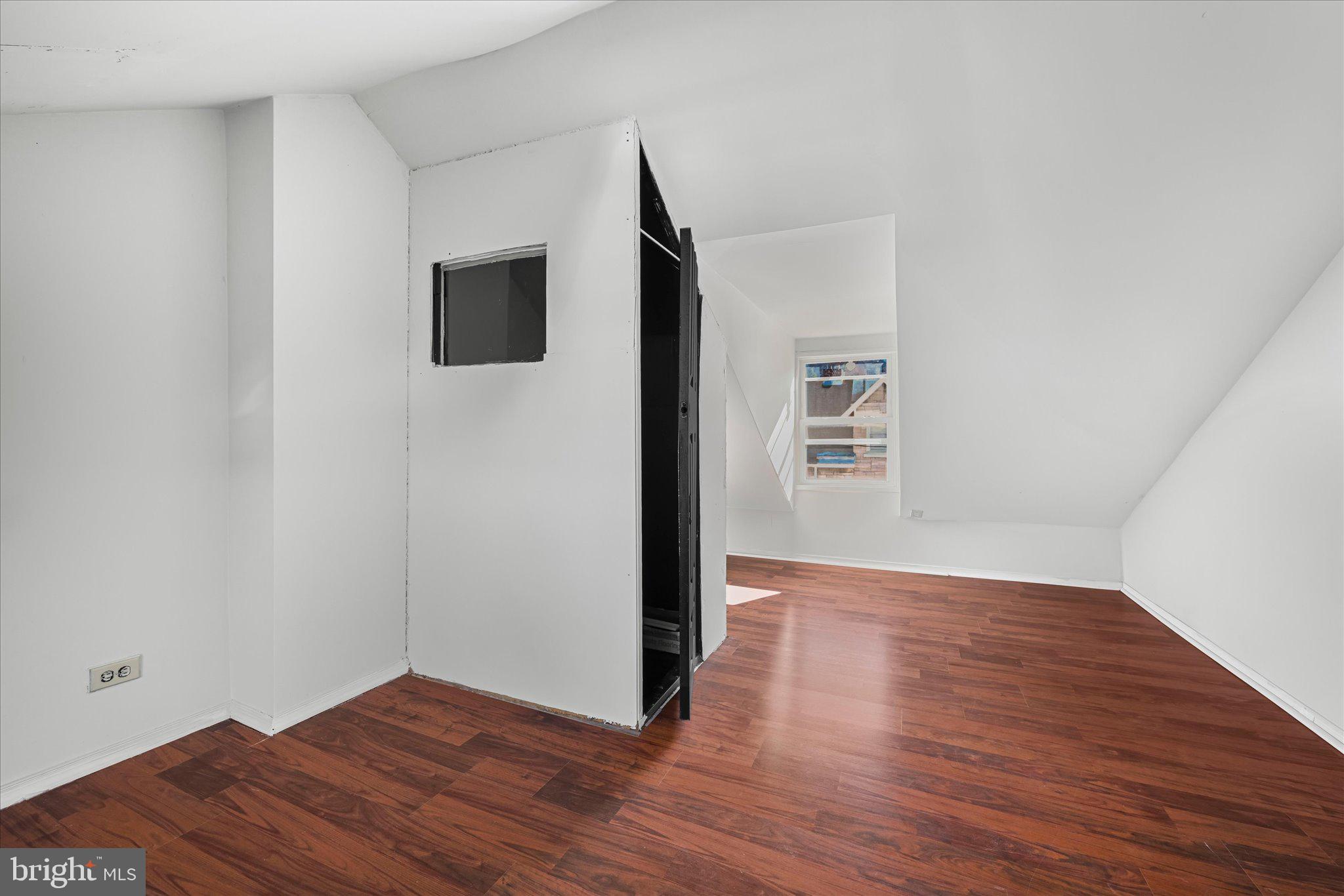 1042 Locust Street Reading, PA 19604 - Photo 22 of 28 a view of a livingroom with wooden floor
