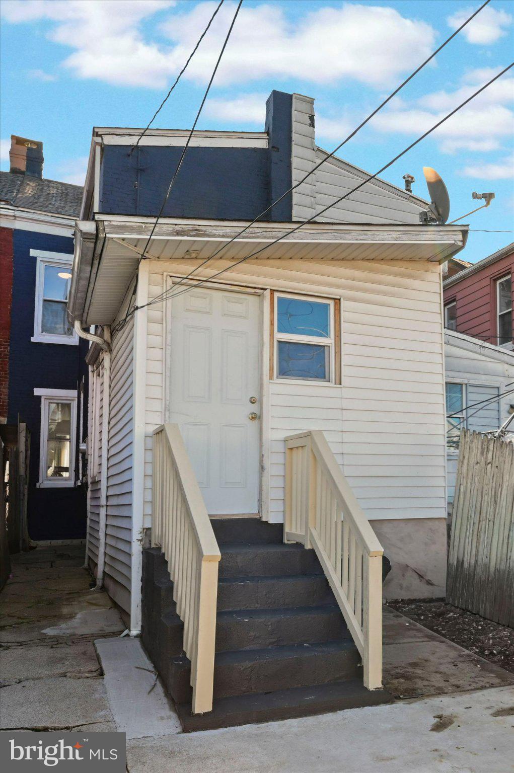 1042 Locust Street Reading, PA 19604 - Photo 25 of 28 a view of a house with wooden stairs