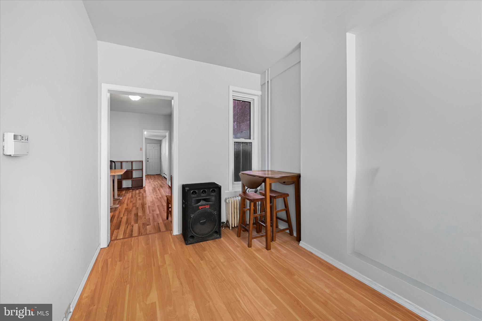 1042 Locust Street Reading, PA 19604 - Photo 7 of 28 a view of livingroom with furniture and workspace