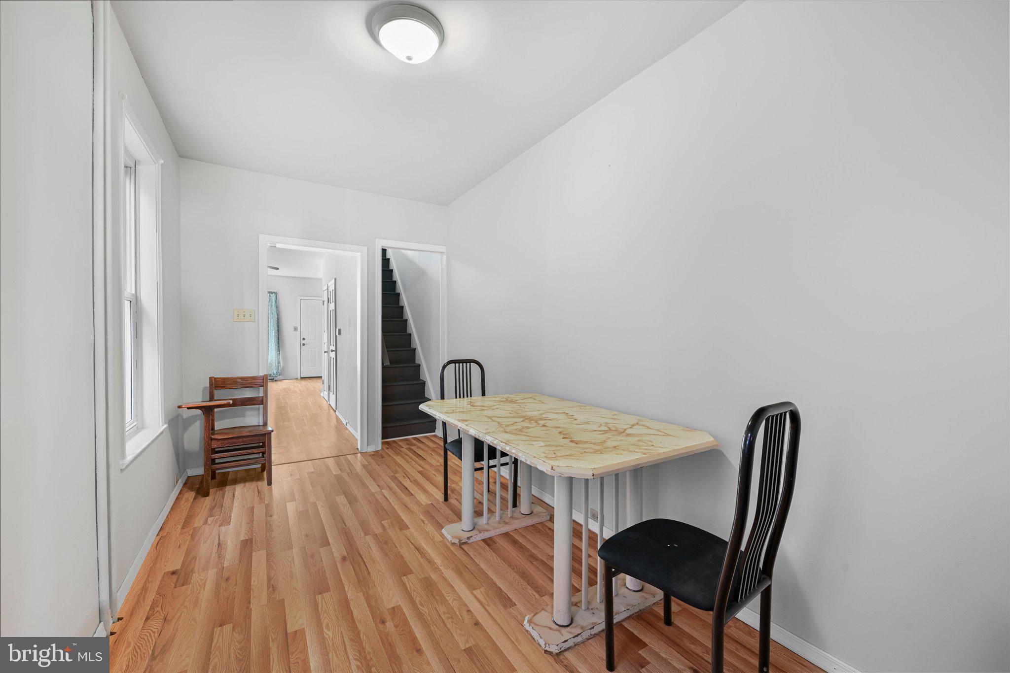1042 Locust Street Reading, PA 19604 - Photo 9 of 28 a view of a dining room with furniture and wooden floor
