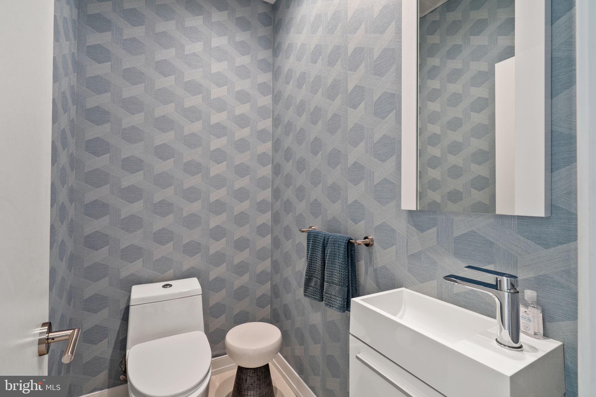 609 Queen Street Philadelphia, PA 19147 - Photo 11 of 29 a white toilet sitting next to a white sink