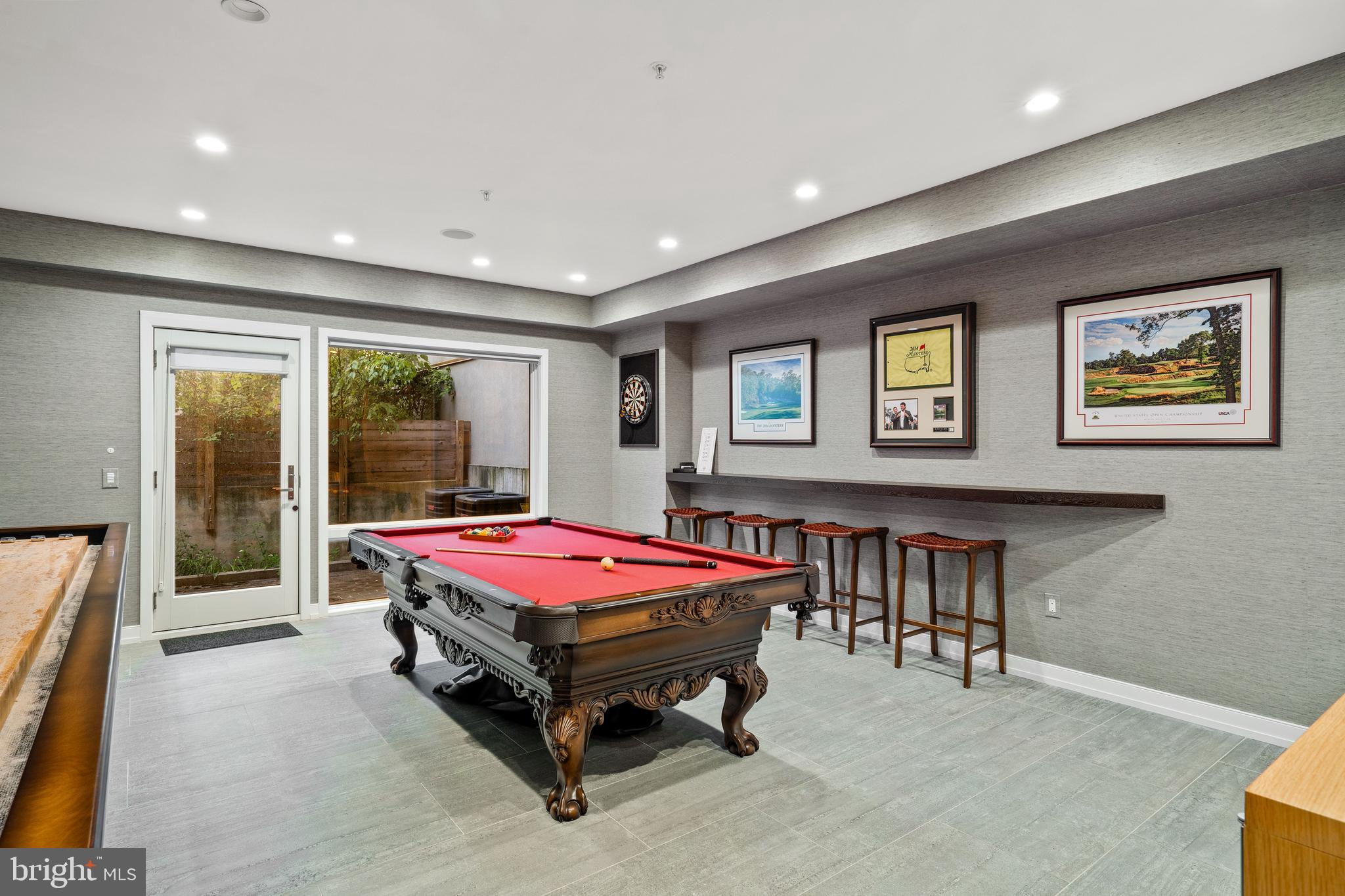 609 Queen Street Philadelphia, PA 19147 - Photo 4 of 29 a living room with a pool table and a flat screen tv