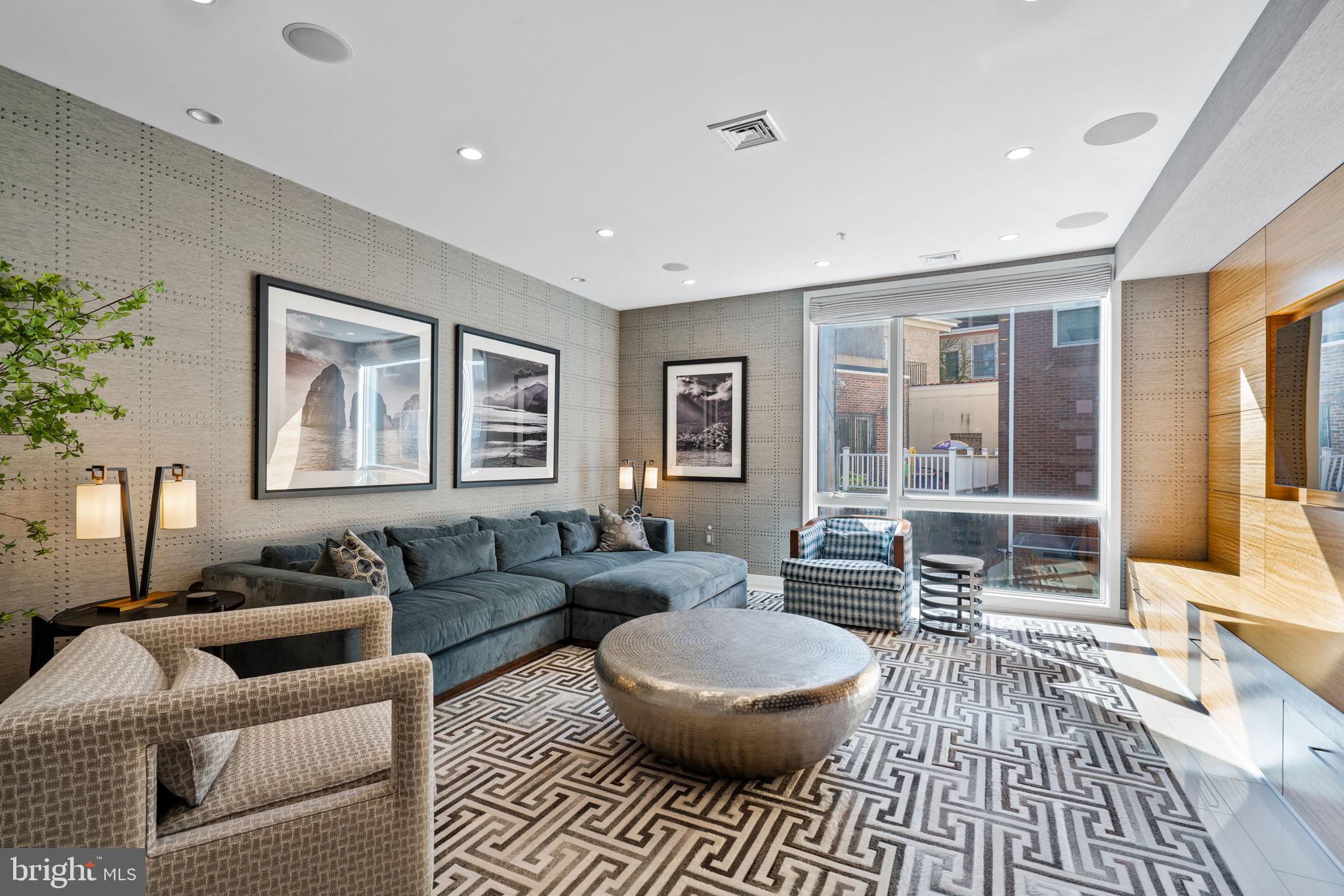 609 Queen Street Philadelphia, PA 19147 - Photo 10 of 29 a living room with furniture and a rug