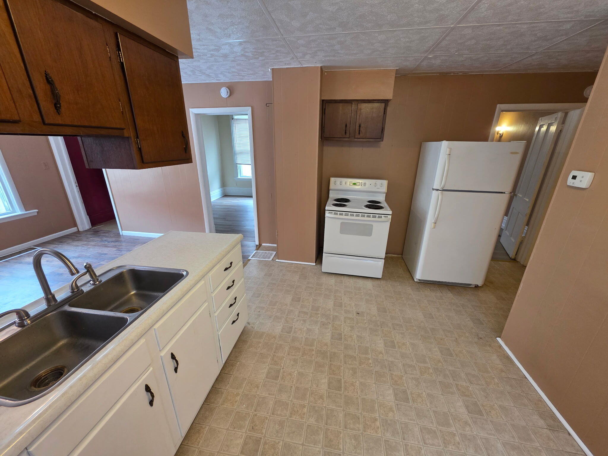 75 Filer Street, Unit 1 Manistee, MI 49660 - Photo 4 of 7 (3) IMG_20260210_103040 Kitchen