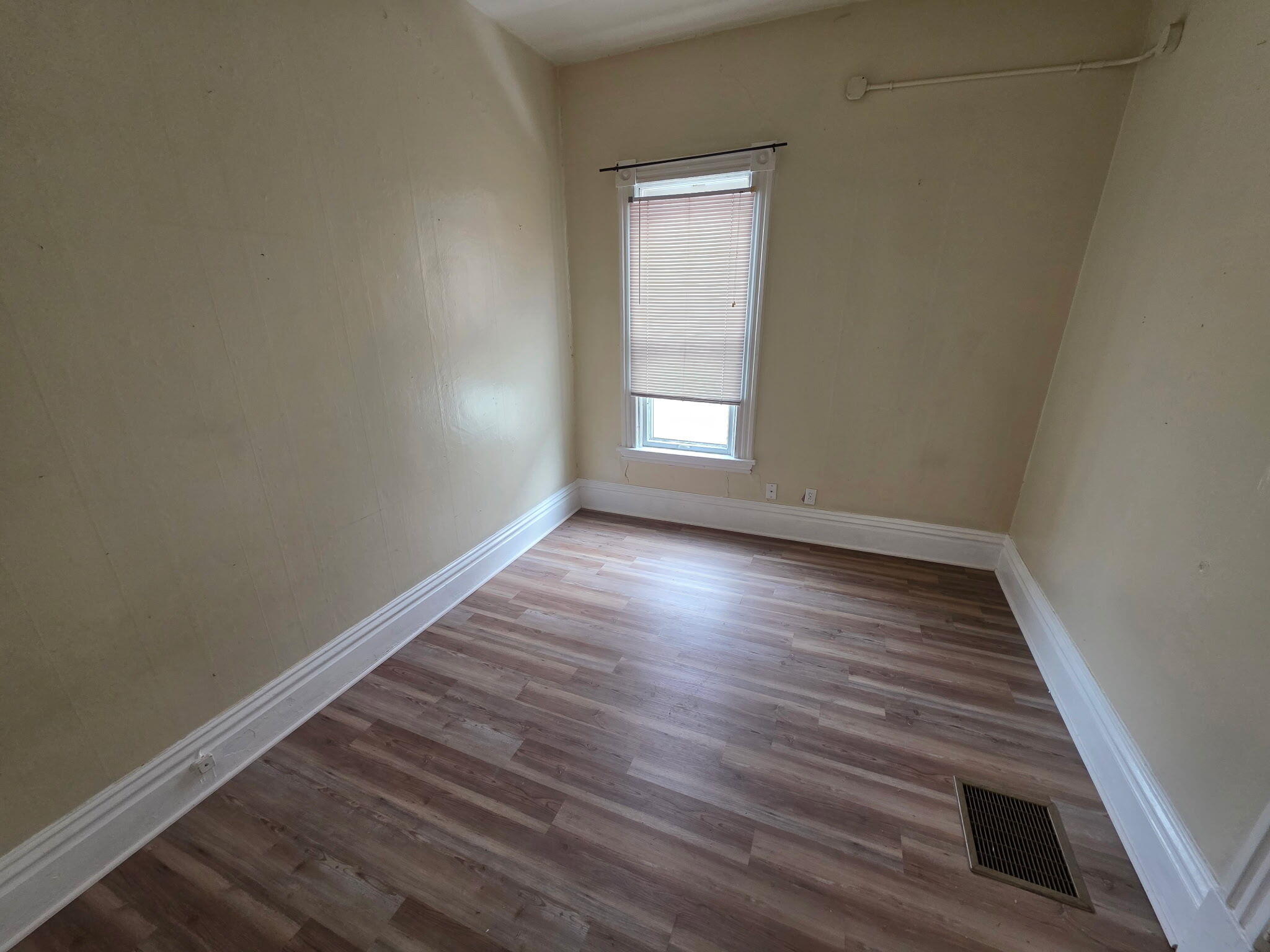 75 Filer Street, Unit 1 Manistee, MI 49660 - Photo 6 of 7 (5) IMG_20260210_103052 Bedroom 2