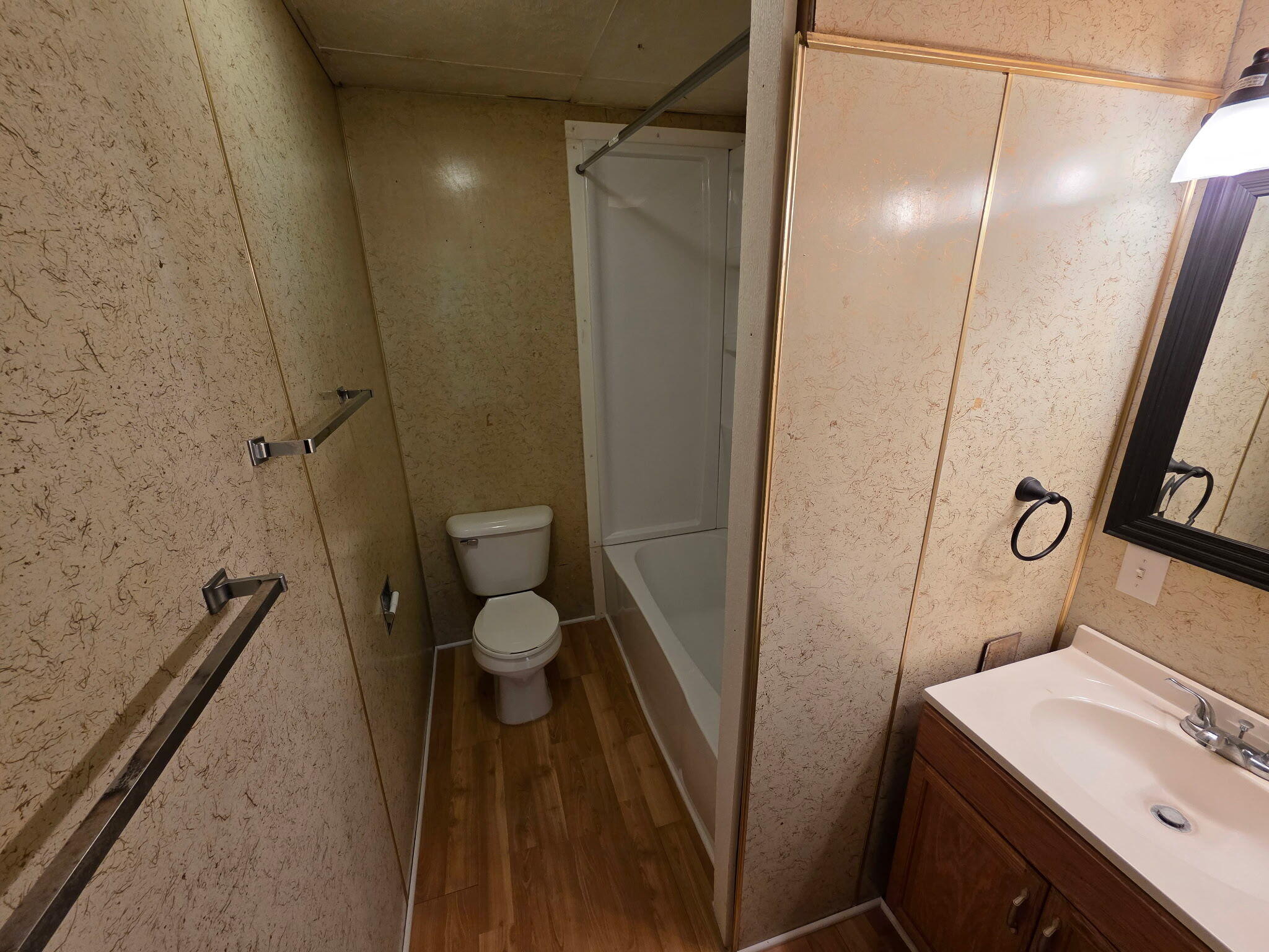 75 Filer Street, Unit 1 Manistee, MI 49660 - Photo 7 of 7 (6) IMG_20260210_103044 Bathroom