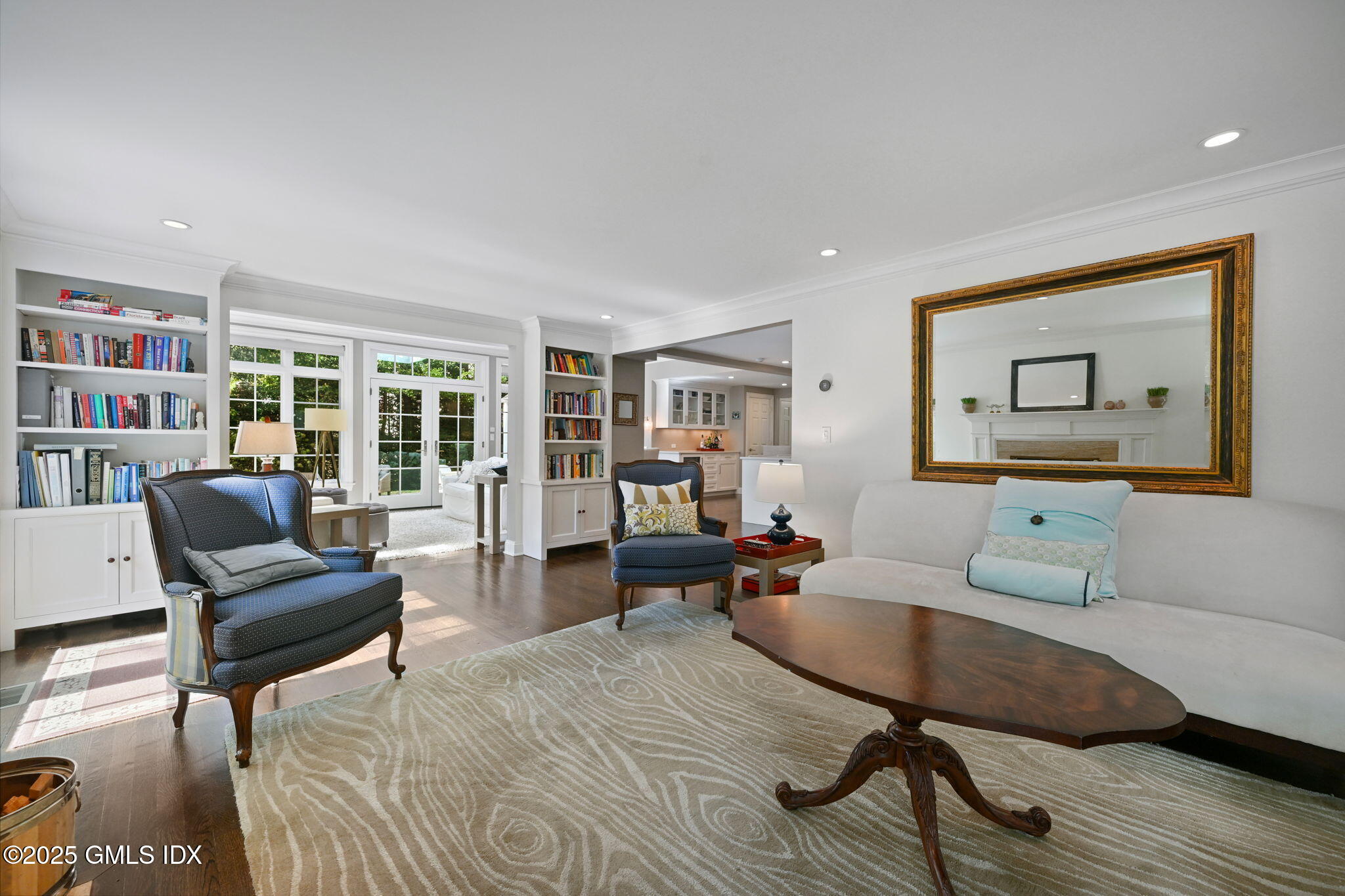 37 Ridgeview Avenue Greenwich, CT 06830 - Photo 11 of 49 a living room with furniture and a book shelf