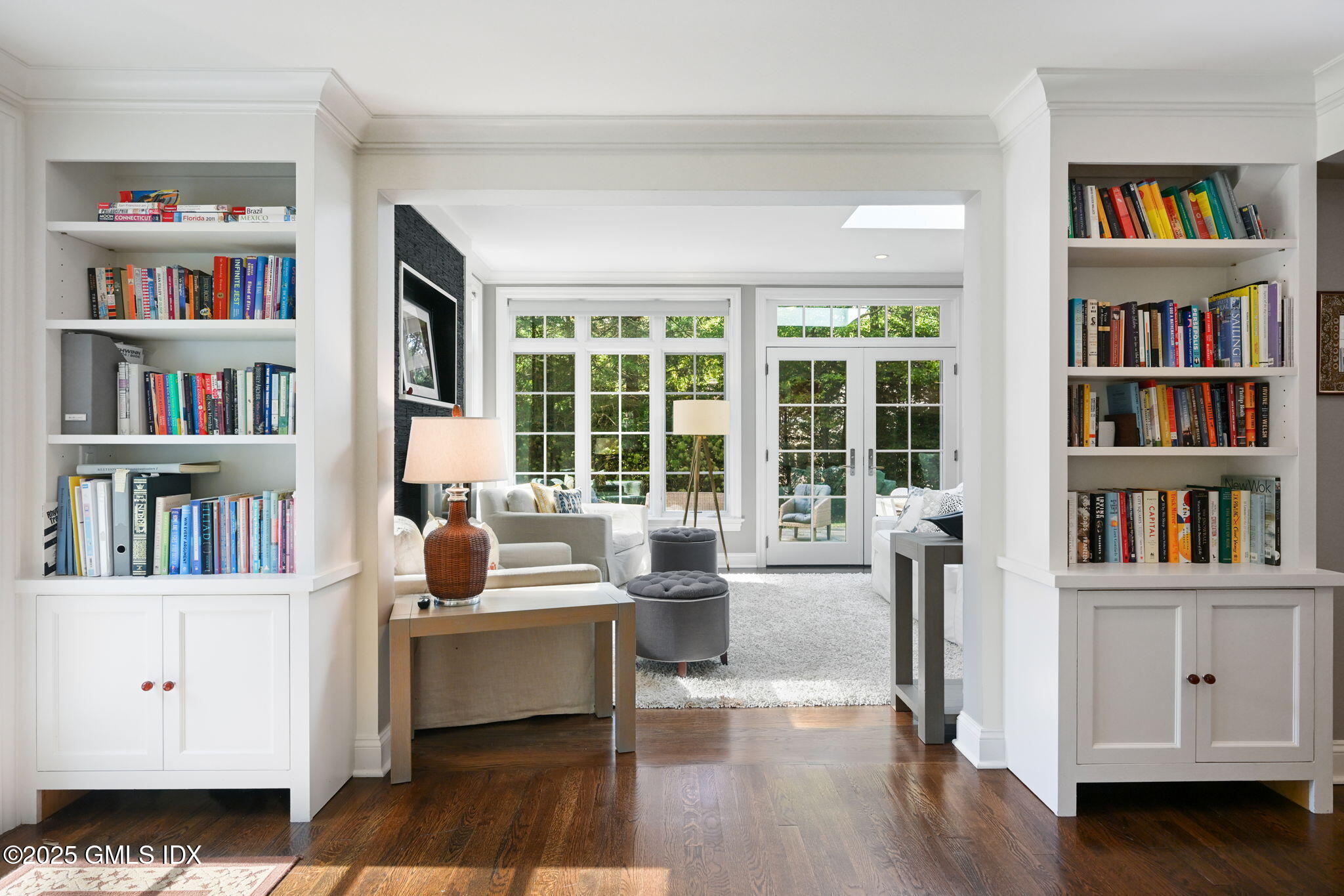 37 Ridgeview Avenue Greenwich, CT 06830 - Photo 12 of 49 a living room with furniture and a book shelf