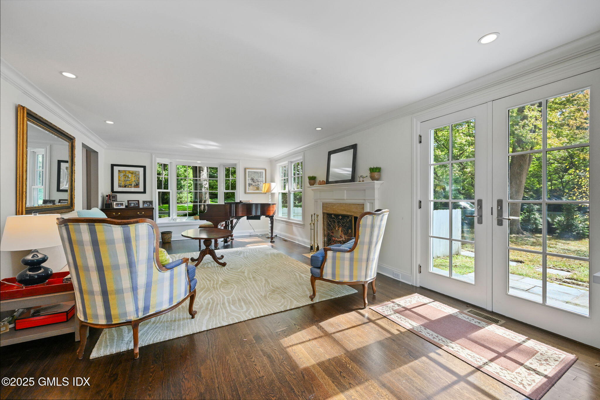 37 Ridgeview Avenue Greenwich, CT 06830 - Photo 13 of 49 a living room with furniture and a fireplace