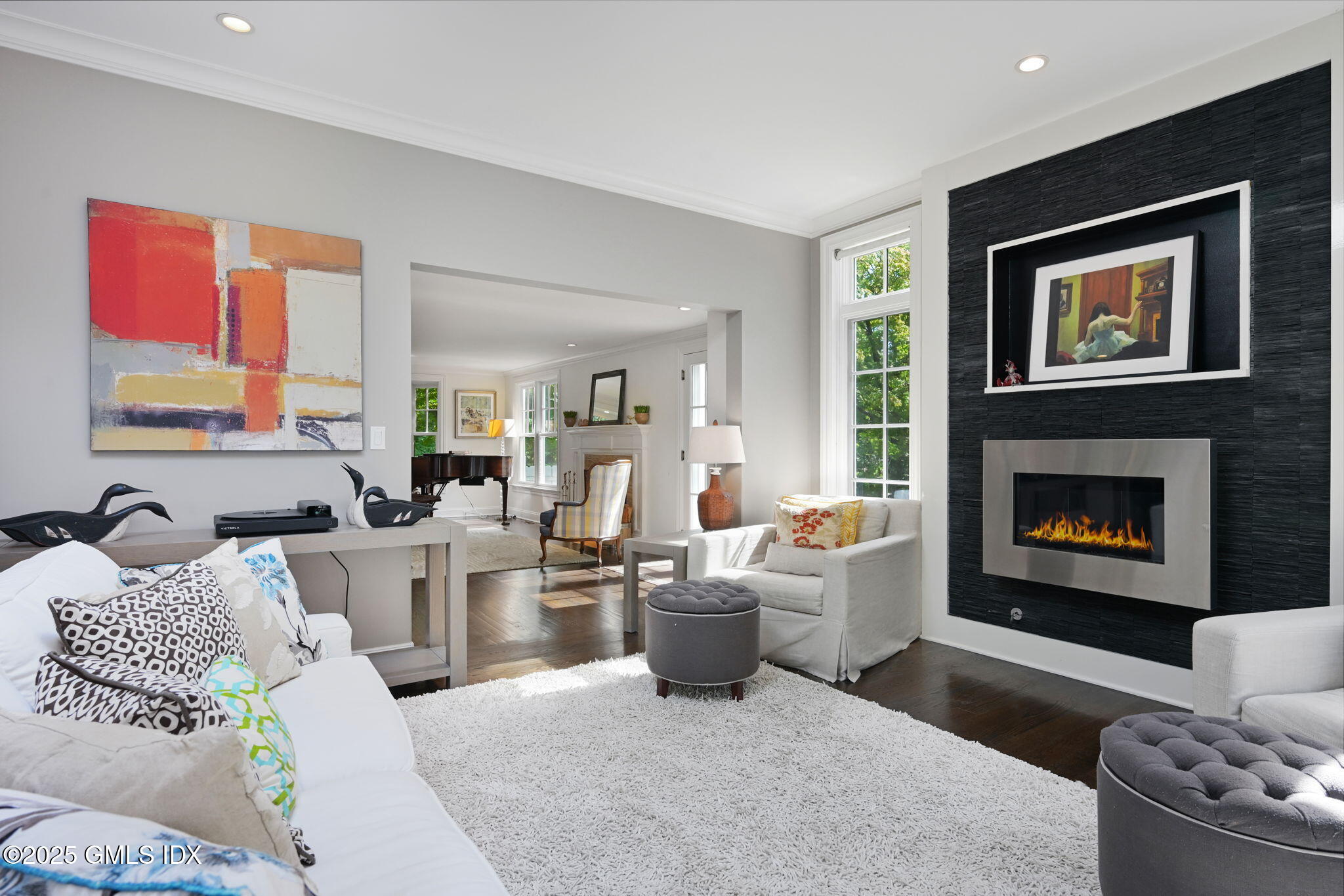 37 Ridgeview Avenue Greenwich, CT 06830 - Photo 16 of 49 a living room with furniture a flat screen tv and a fireplace