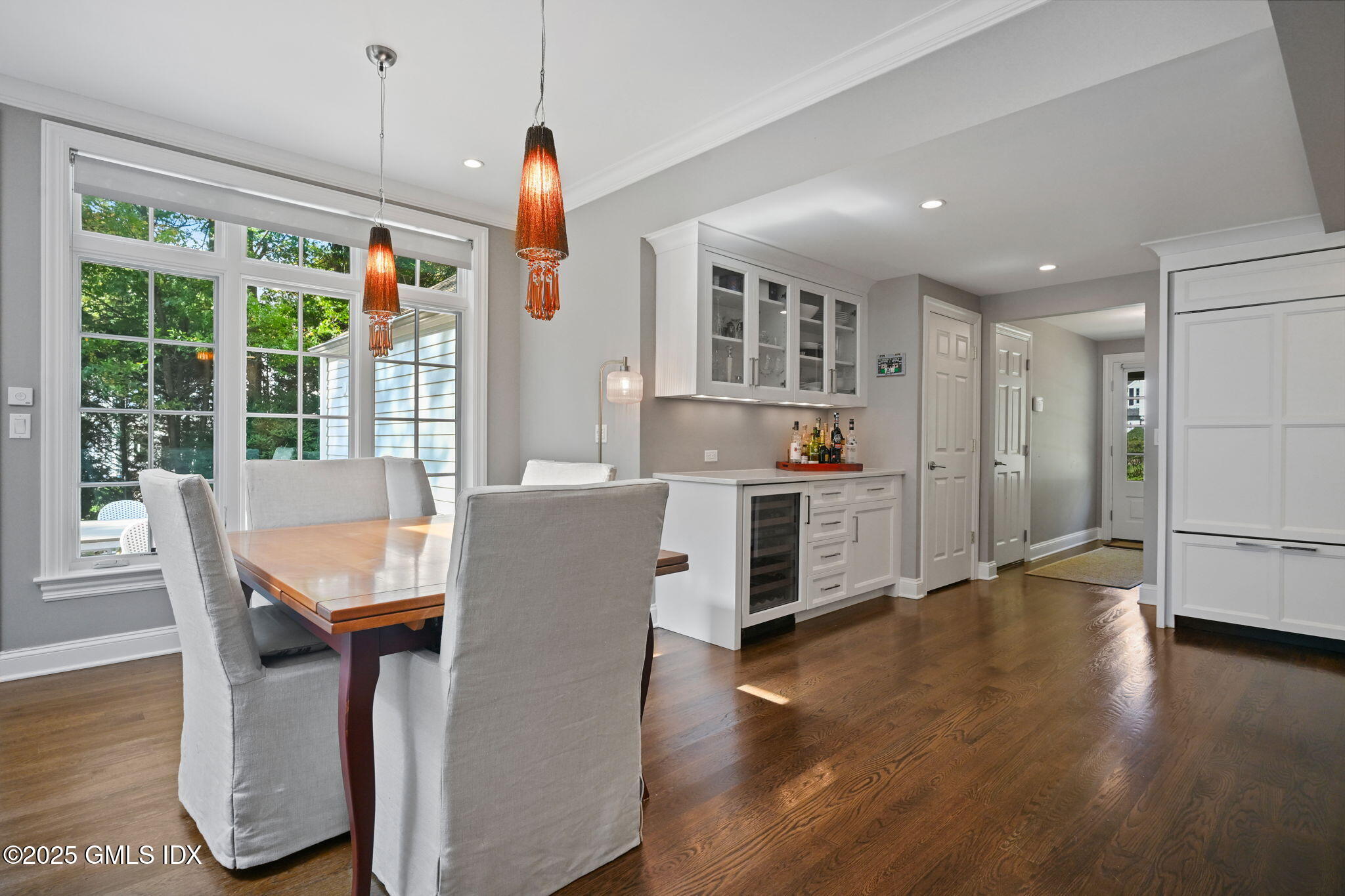 37 Ridgeview Avenue Greenwich, CT 06830 - Photo 18 of 49 a living room with stainless steel appliances kitchen island granite countertop a dining table chairs and a wooden floor