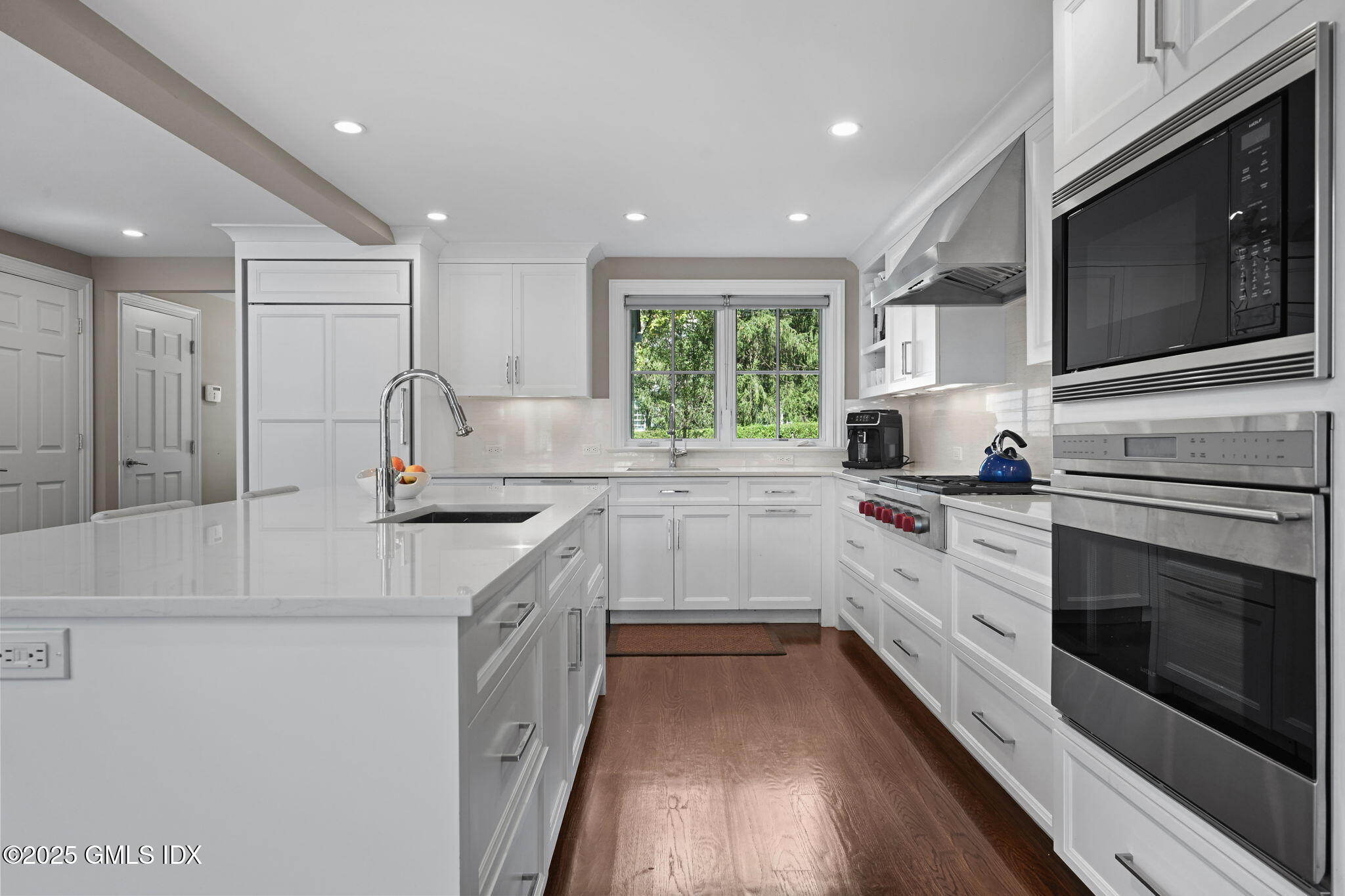37 Ridgeview Avenue Greenwich, CT 06830 - Photo 20 of 49 a kitchen with a sink stove and microwave