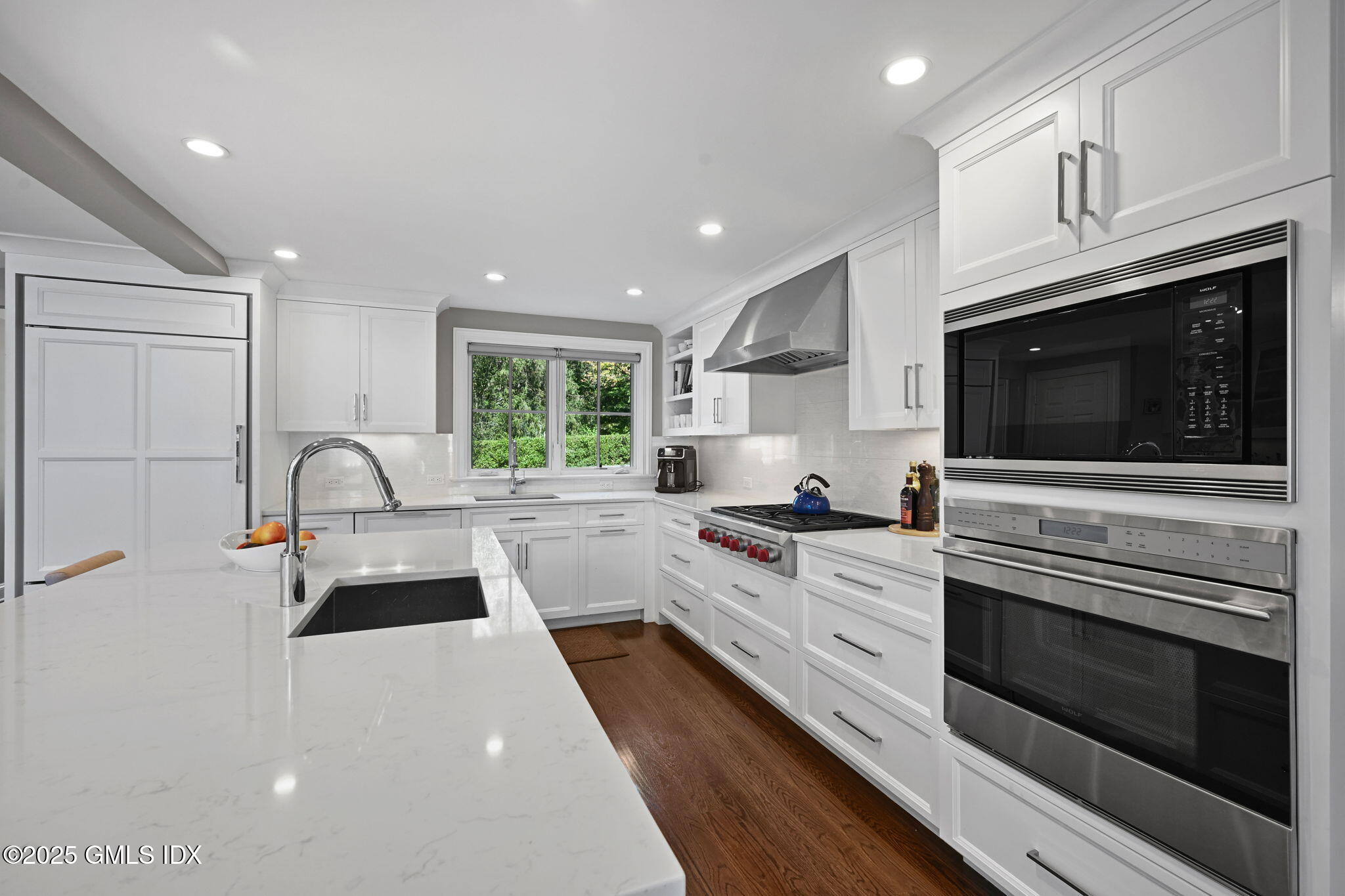 37 Ridgeview Avenue Greenwich, CT 06830 - Photo 22 of 49 a large kitchen with stainless steel appliances granite countertop a stove a sink and a microwave