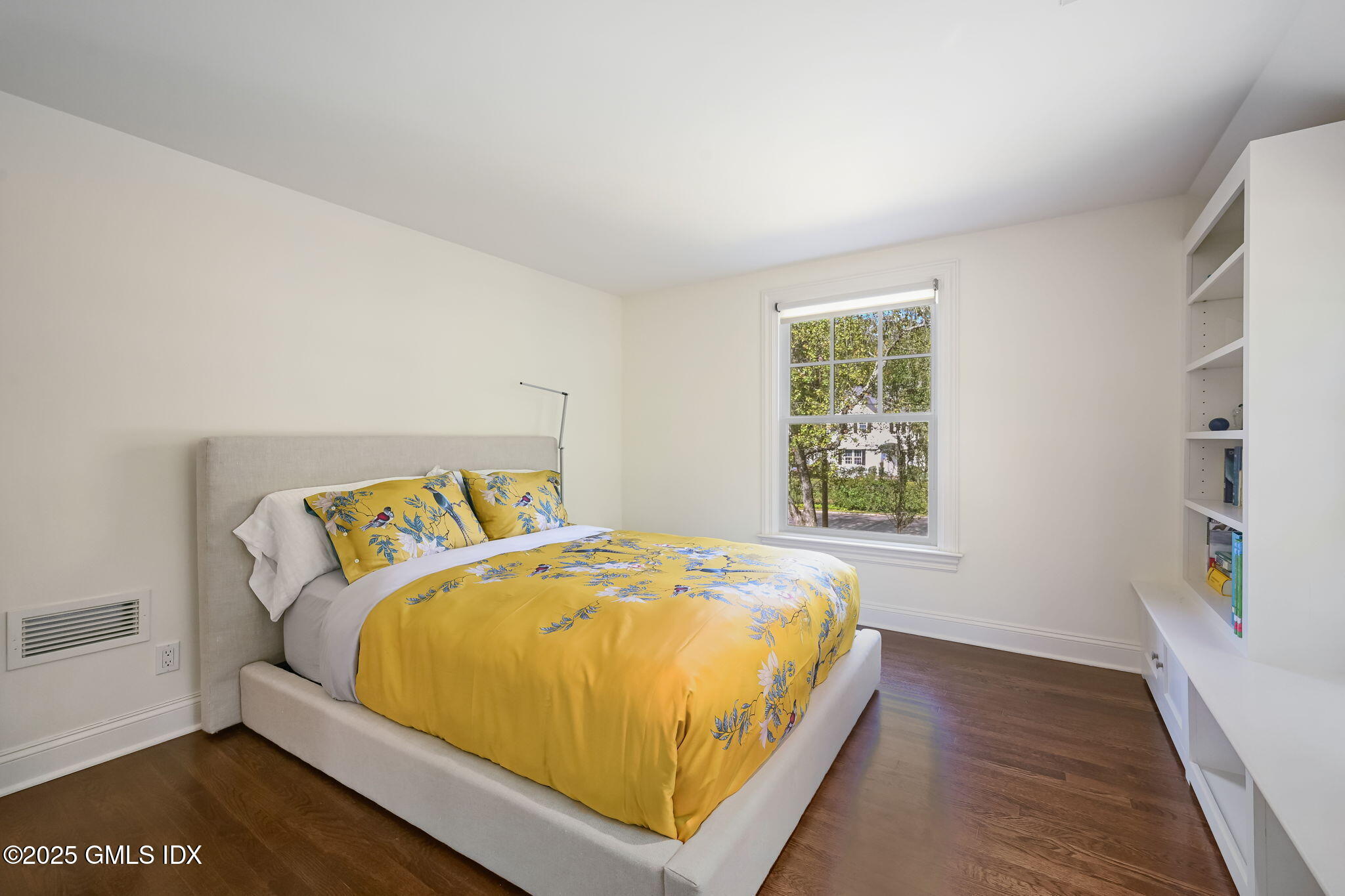 37 Ridgeview Avenue Greenwich, CT 06830 - Photo 37 of 49 a bed sitting in a bedroom next to a window