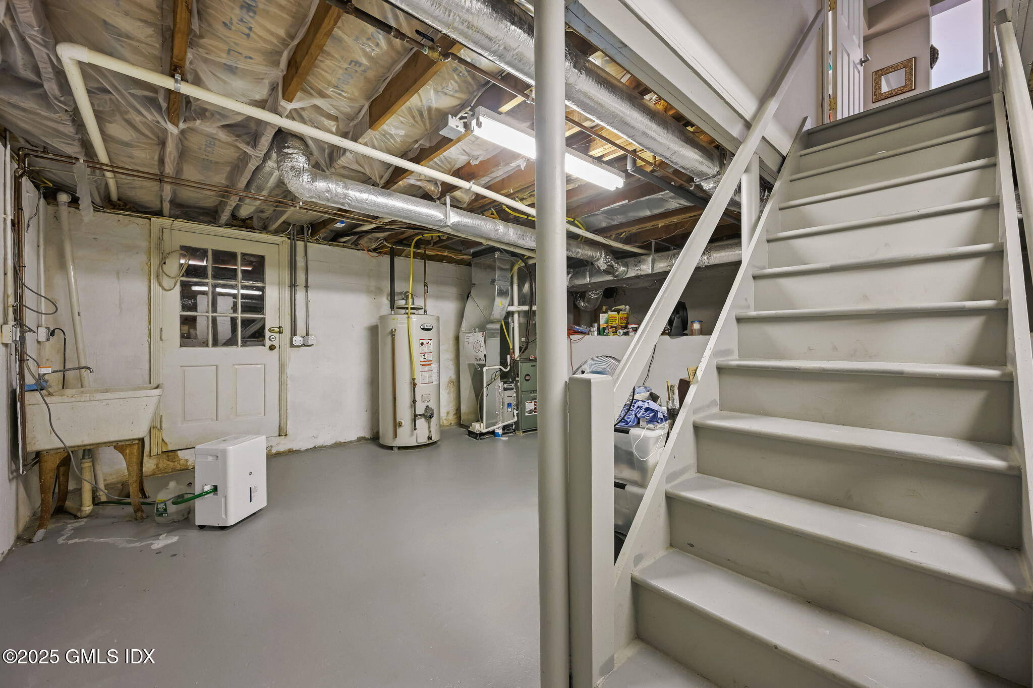 37 Ridgeview Avenue Greenwich, CT 06830 - Photo 38 of 49 a view of an empty room with stairs