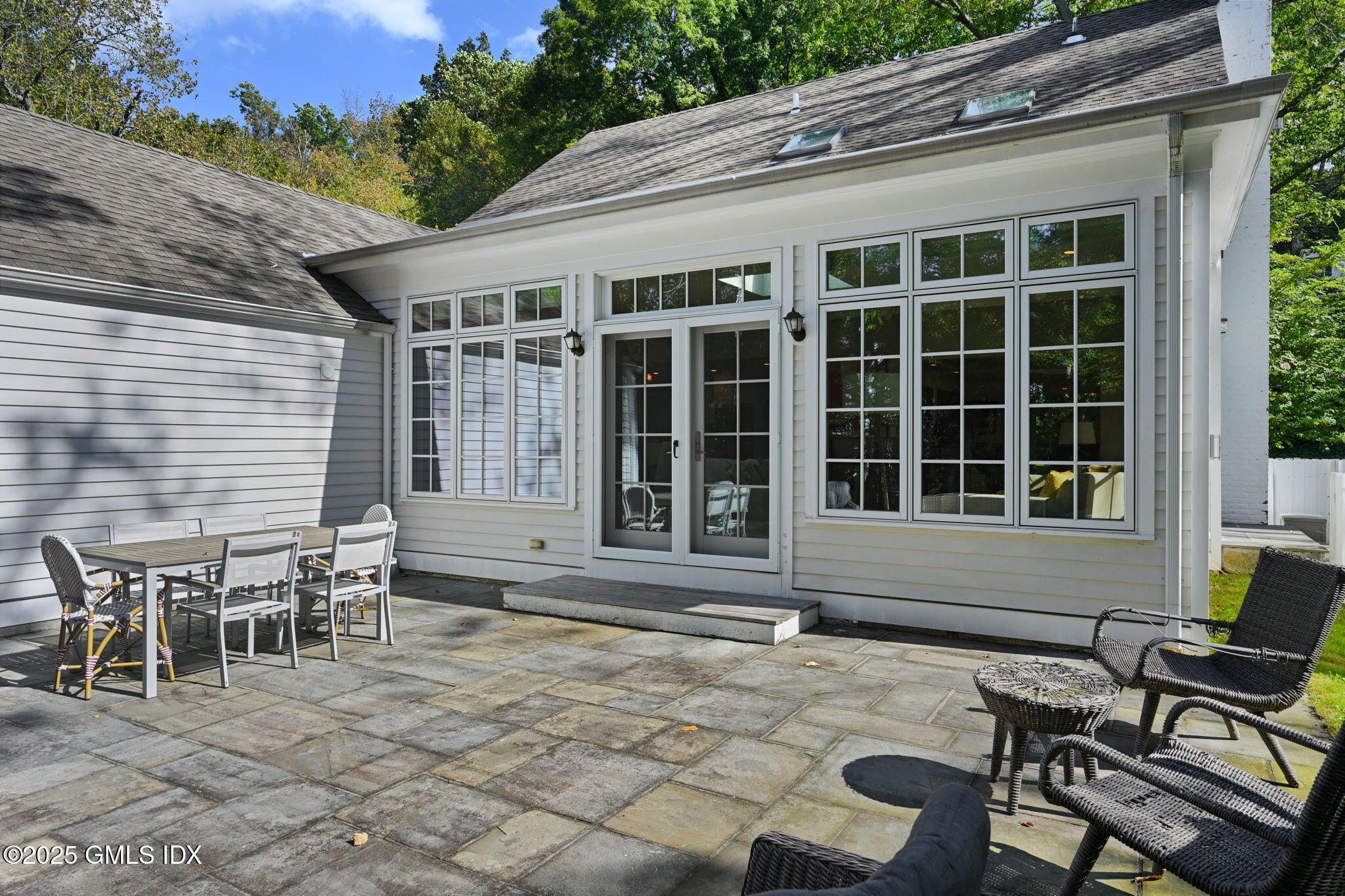 37 Ridgeview Avenue Greenwich, CT 06830 - Photo 41 of 49 a front view of a house with outdoor seating