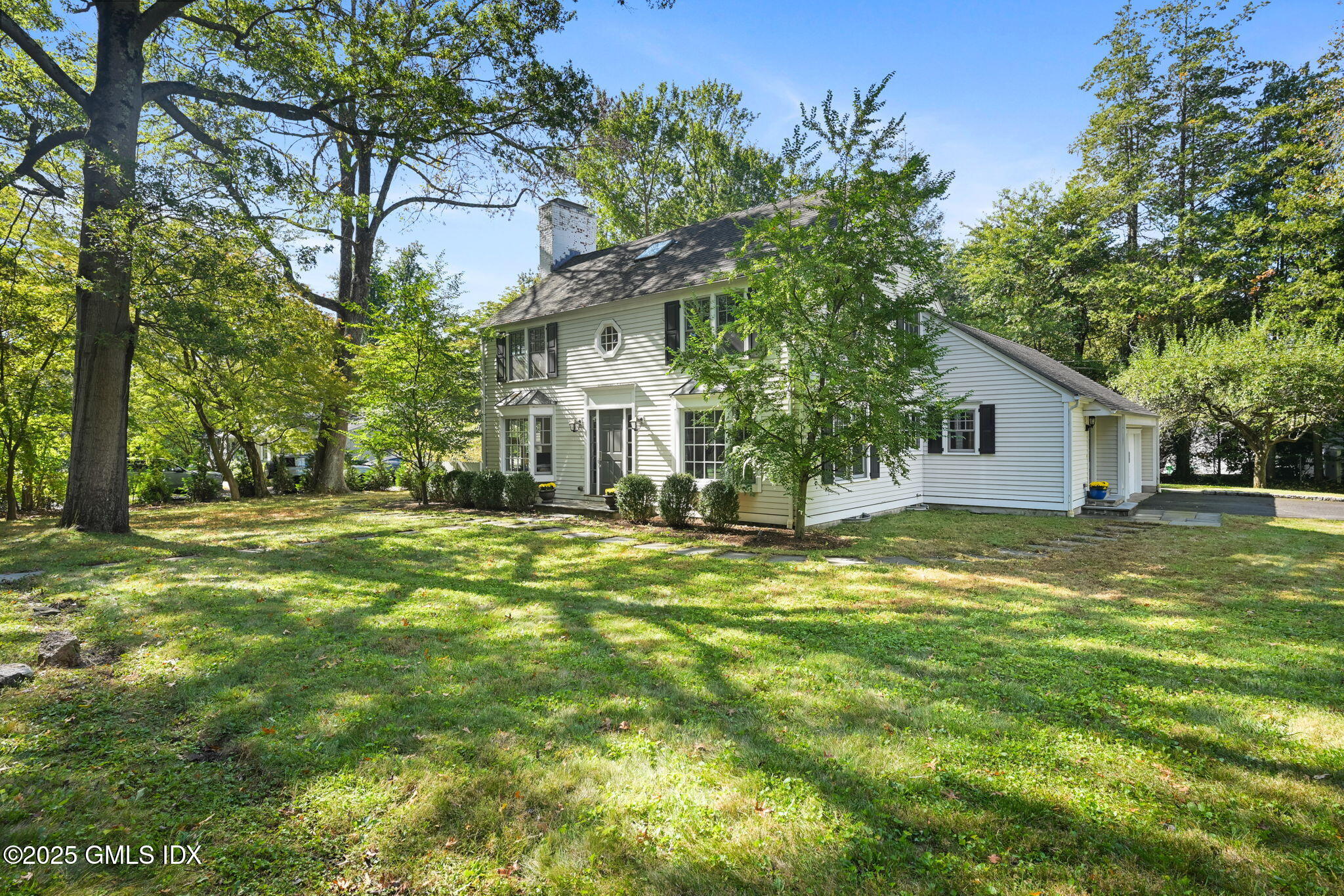 37 Ridgeview Avenue Greenwich, CT 06830 - Photo 47 of 49 a view of a house with a yard