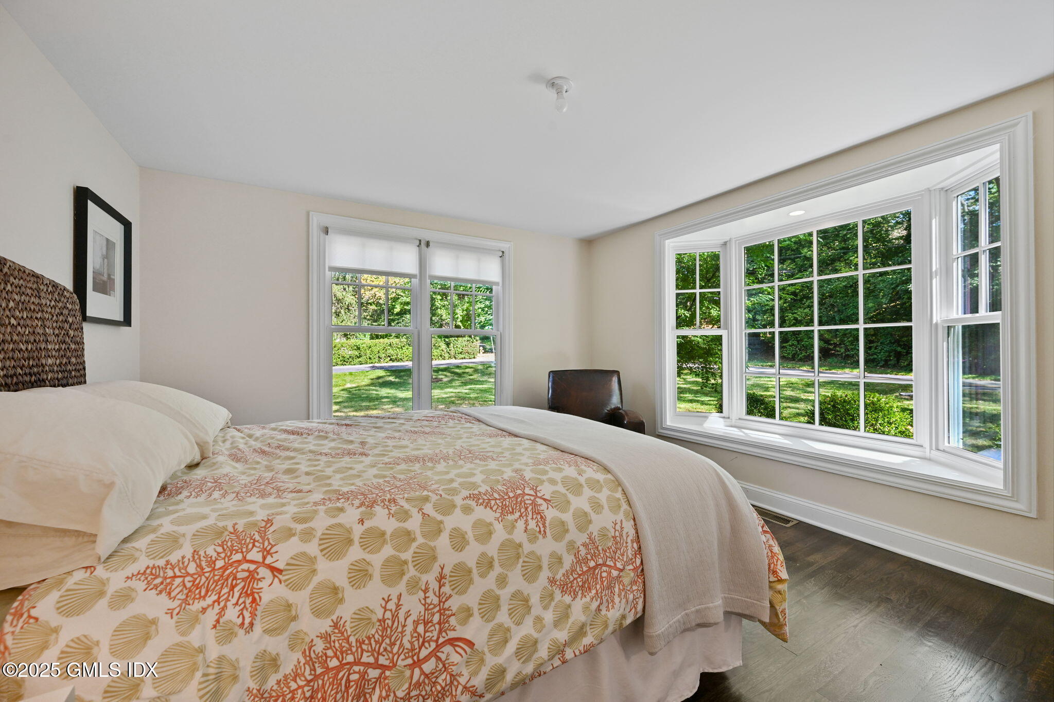 37 Ridgeview Avenue Greenwich, CT 06830 - Photo 6 of 49 a large bed sitting in a bedroom next to a window