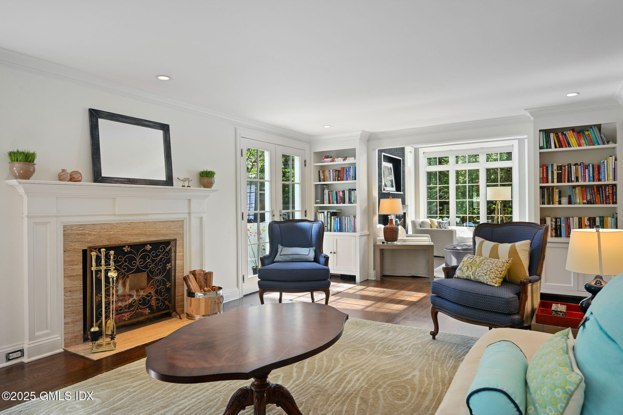 37 Ridgeview Avenue Greenwich, CT 06830 - Photo 7 of 49 a living room with furniture fireplace and a table