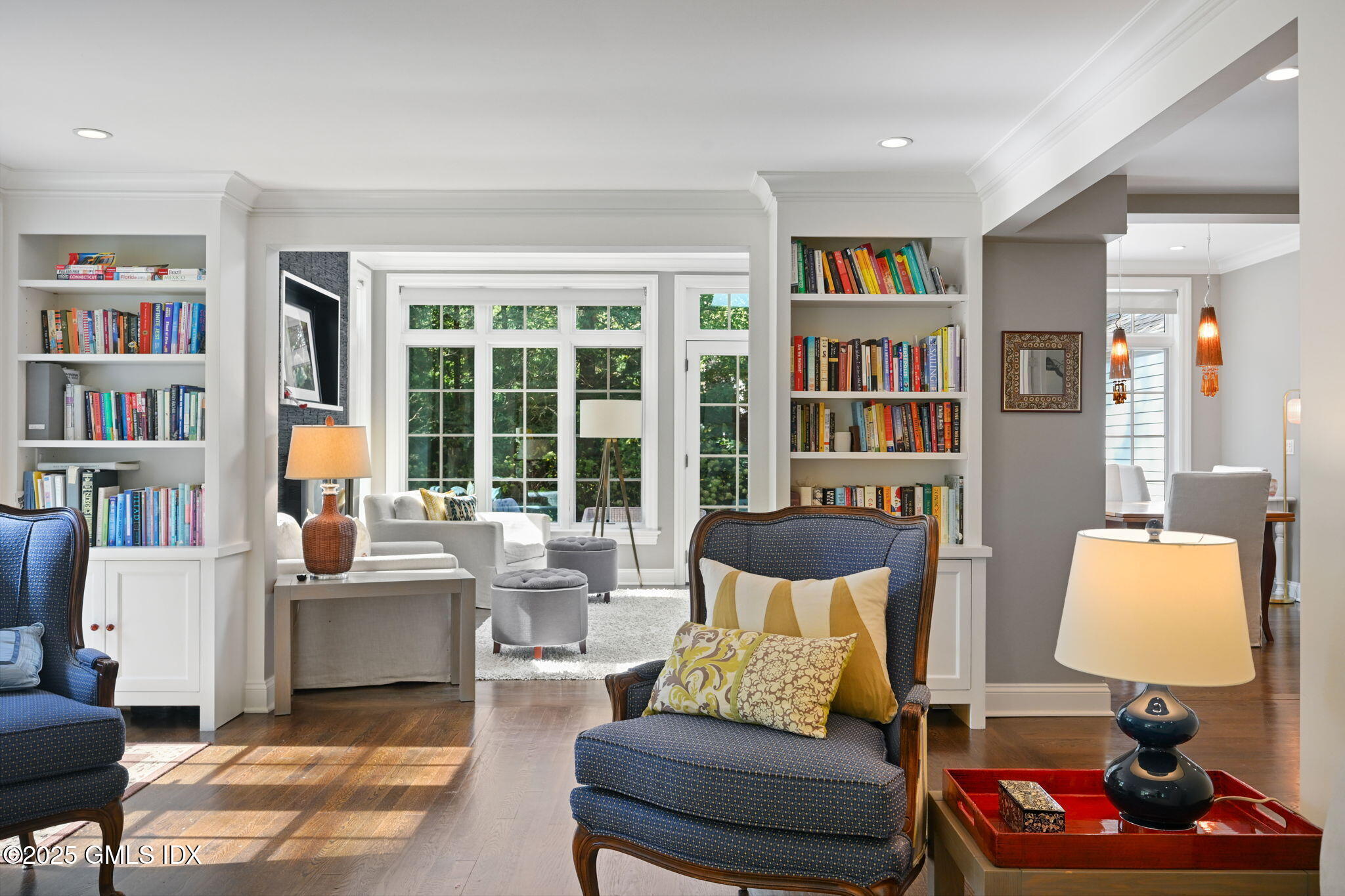 37 Ridgeview Avenue Greenwich, CT 06830 - Photo 8 of 49 a living room with furniture and a book shelf