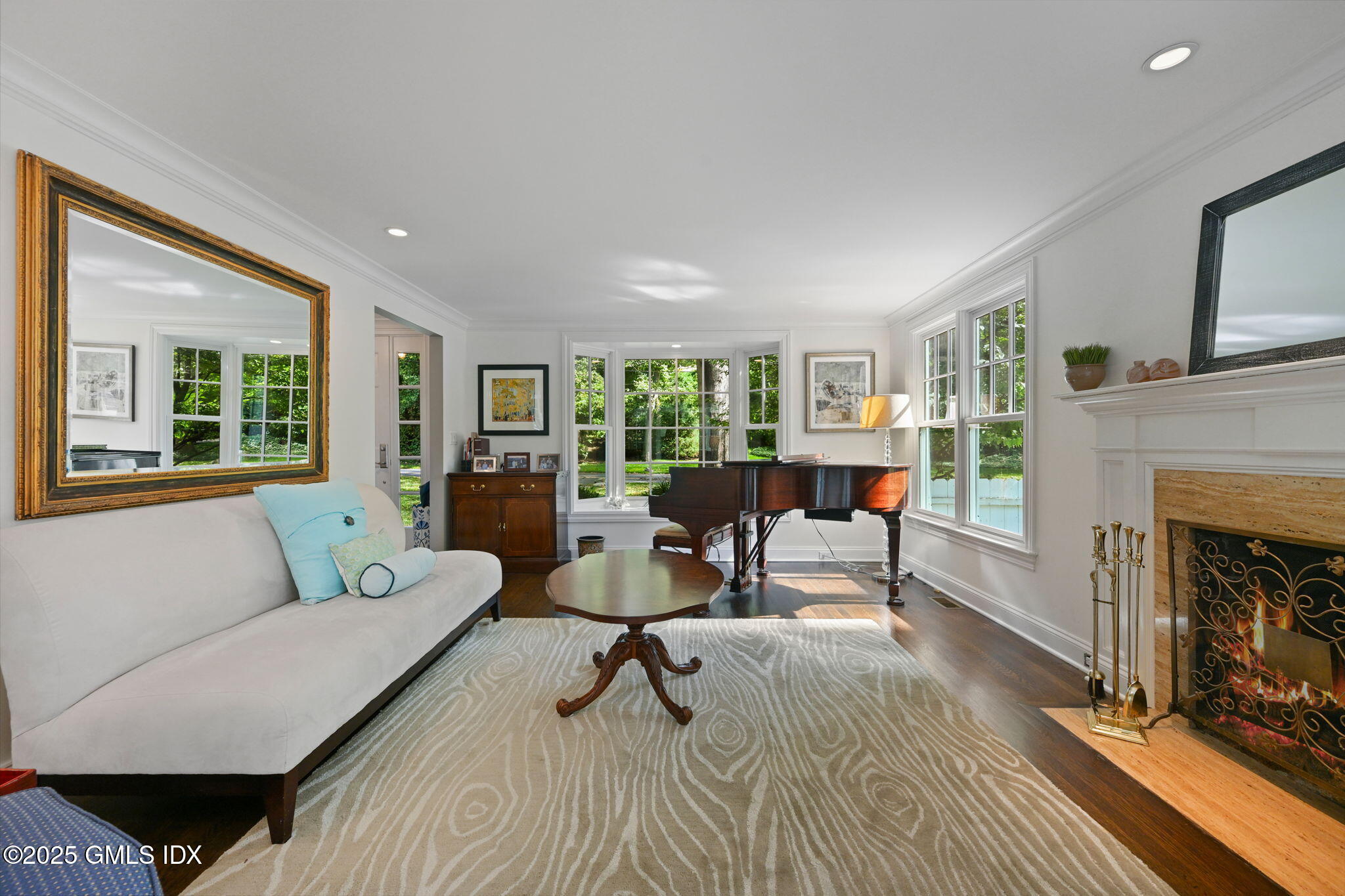 37 Ridgeview Avenue Greenwich, CT 06830 - Photo 9 of 49 a living room with furniture and a fireplace