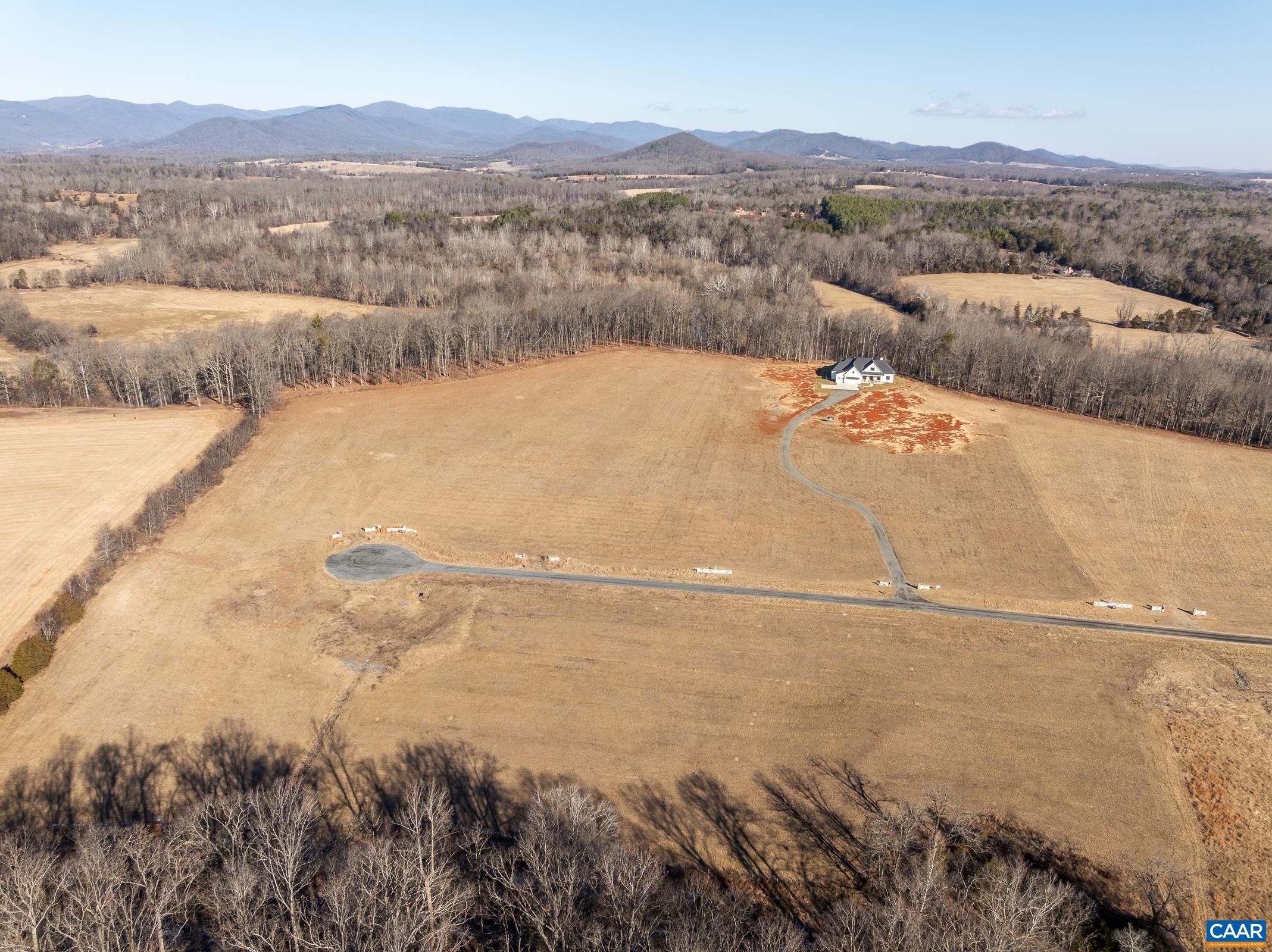 18 Grange Cmns Ridge, Unit 18 Gladstone, VA 24553 - Photo 11 of 17 a view of lake and mountain