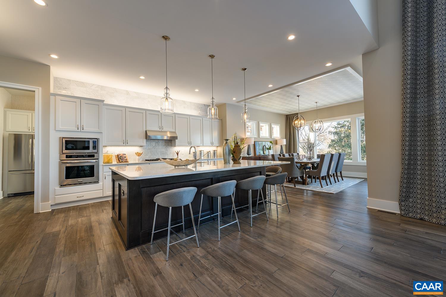 18 Grange Cmns Ridge, Unit 18 Gladstone, VA 24553 - Photo 4 of 17 a kitchen with lots of counter space and furniture