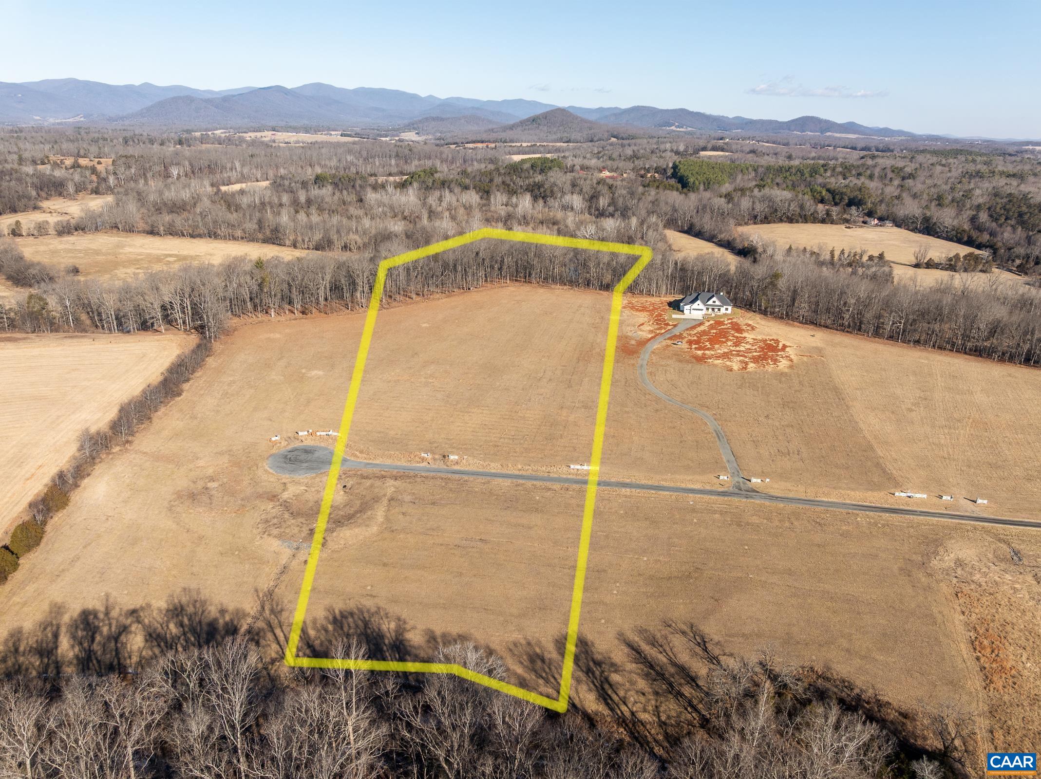 18 Grange Cmns Ridge, Unit 18 Gladstone, VA 24553 - Photo 10 of 17 a view of a lake with a mountain