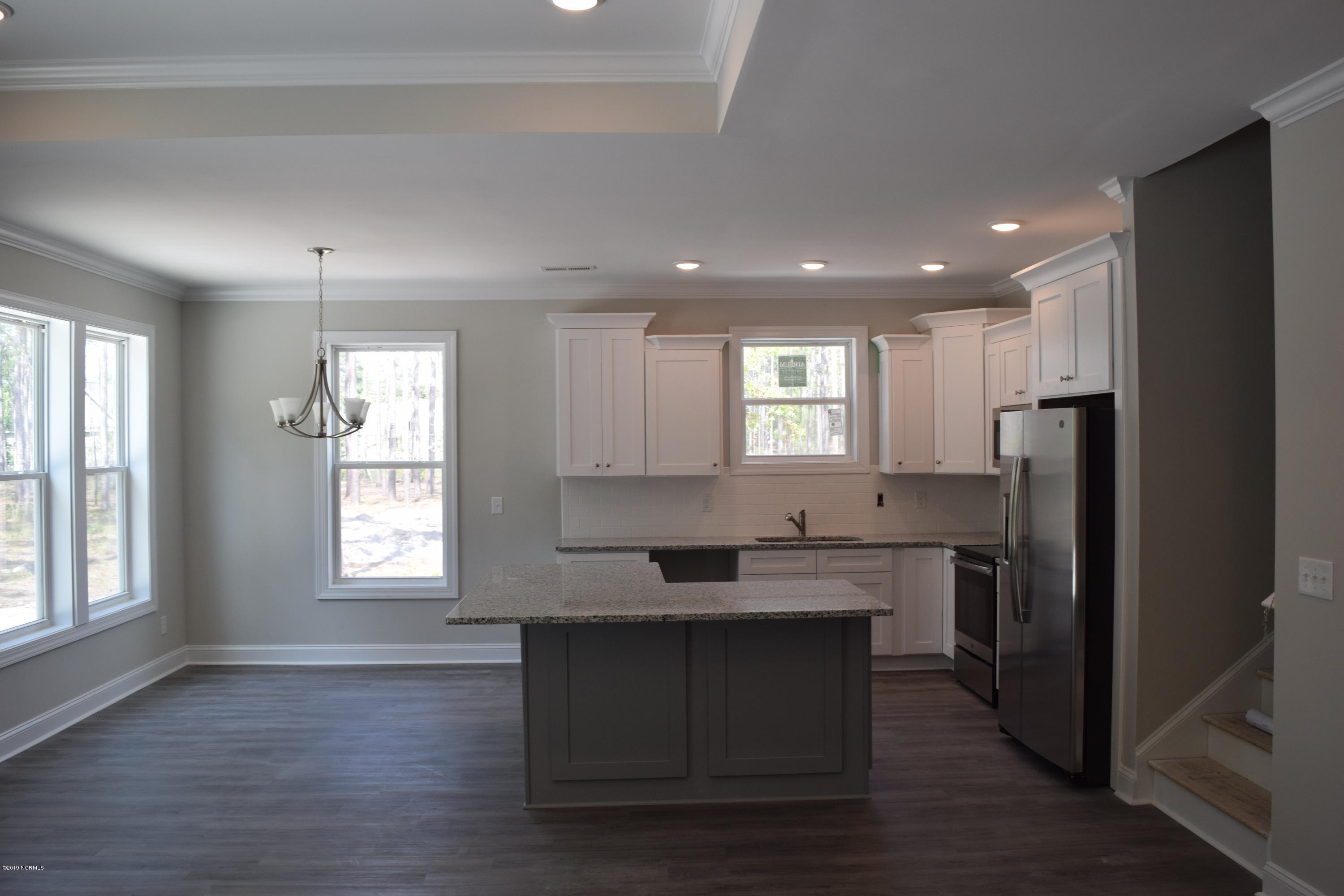 861 Trevino Road Boiling Spring Lakes, NC 28461 - Photo 8 of 12 Open Kitchen and Dining with center isla