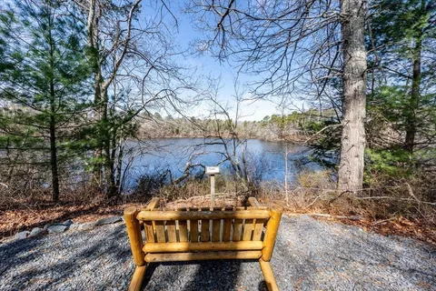 a view of an outdoor sitting area with furniture