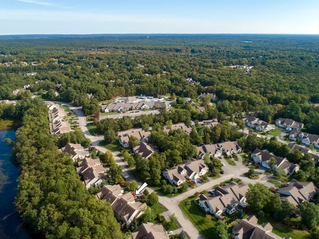 an aerial view of a city with lots of residential buildings