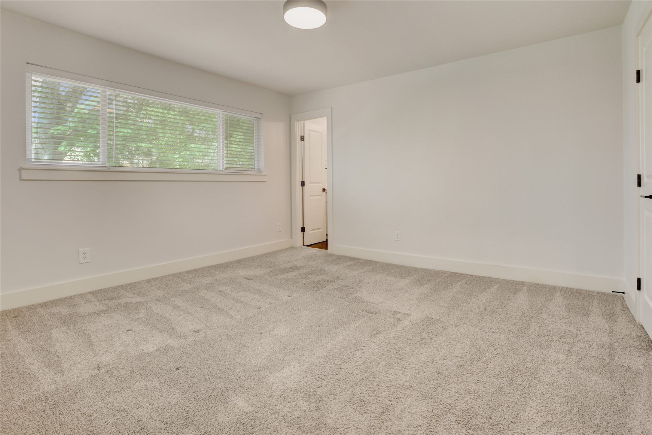 5514 Indigo Street Houston, TX 77096 - Photo 14 of 22 an empty room with windows