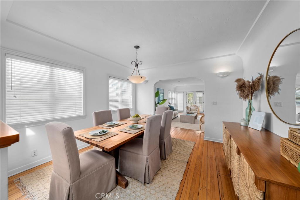 412 5th Street Manhattan Beach, CA 90266 - Photo 13 of 44 a view of a dining room with furniture window and wooden floor