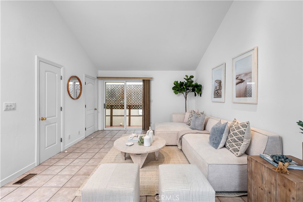 412 5th Street Manhattan Beach, CA 90266 - Photo 16 of 44 a living room with furniture a chandelier and a window