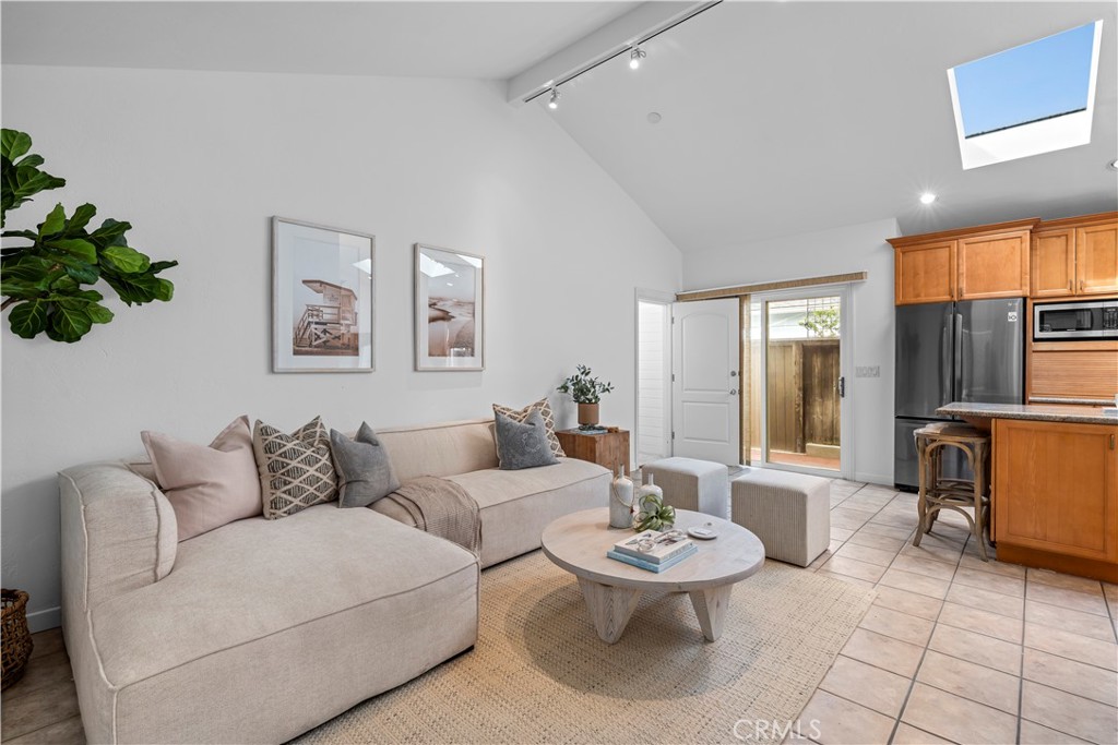 412 5th Street Manhattan Beach, CA 90266 - Photo 20 of 44 a living room with furniture and a large window