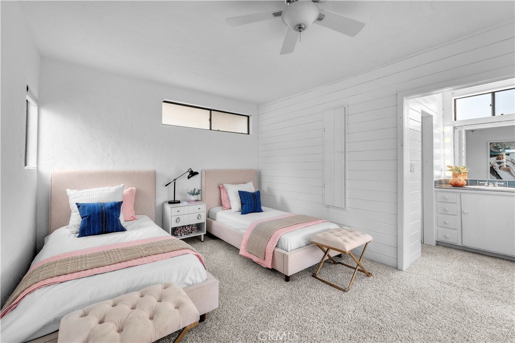 412 5th Street Manhattan Beach, CA 90266 - Photo 30 of 44 a bedroom with two beds and painting on the wall