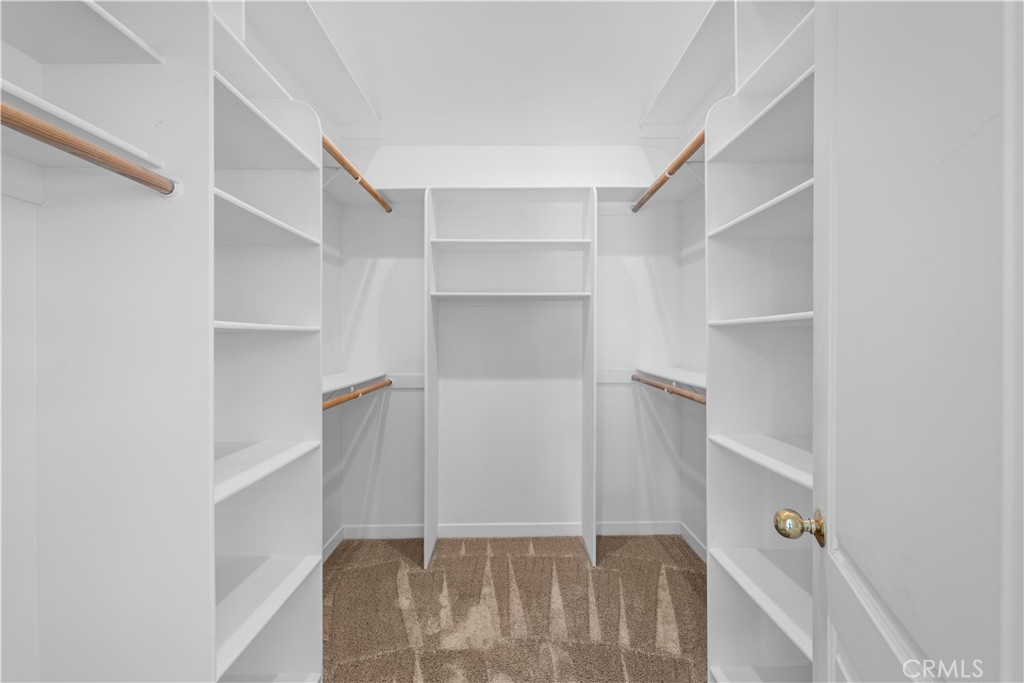 412 5th Street Manhattan Beach, CA 90266 - Photo 38 of 44 a view of walk in closet with empty racks