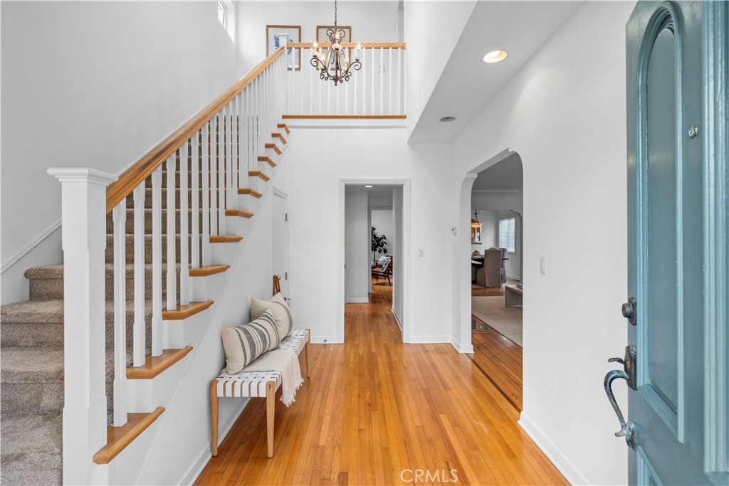 412 5th Street Manhattan Beach, CA 90266 - Photo 6 of 44 a view of a hallway with wooden floor and stairs