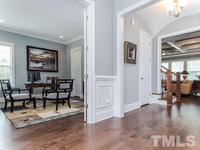 3619 Rolston Drive Raleigh, NC 27609 - Photo 3 of 24 Lovely entry to welcome guests because space and light and views abound. Oak floors, prominent chair railing and deep crown molding lend a feeling of fresh and bright.