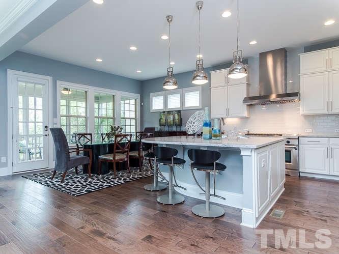 3619 Rolston Drive Raleigh, NC 27609 - Photo 8 of 24 Designer kitchen opens into sunlit Breakfast Room. Recessed Can Lighting and wonderful special lighting over island/peninsula creates an amazing place for gourmet cooking.