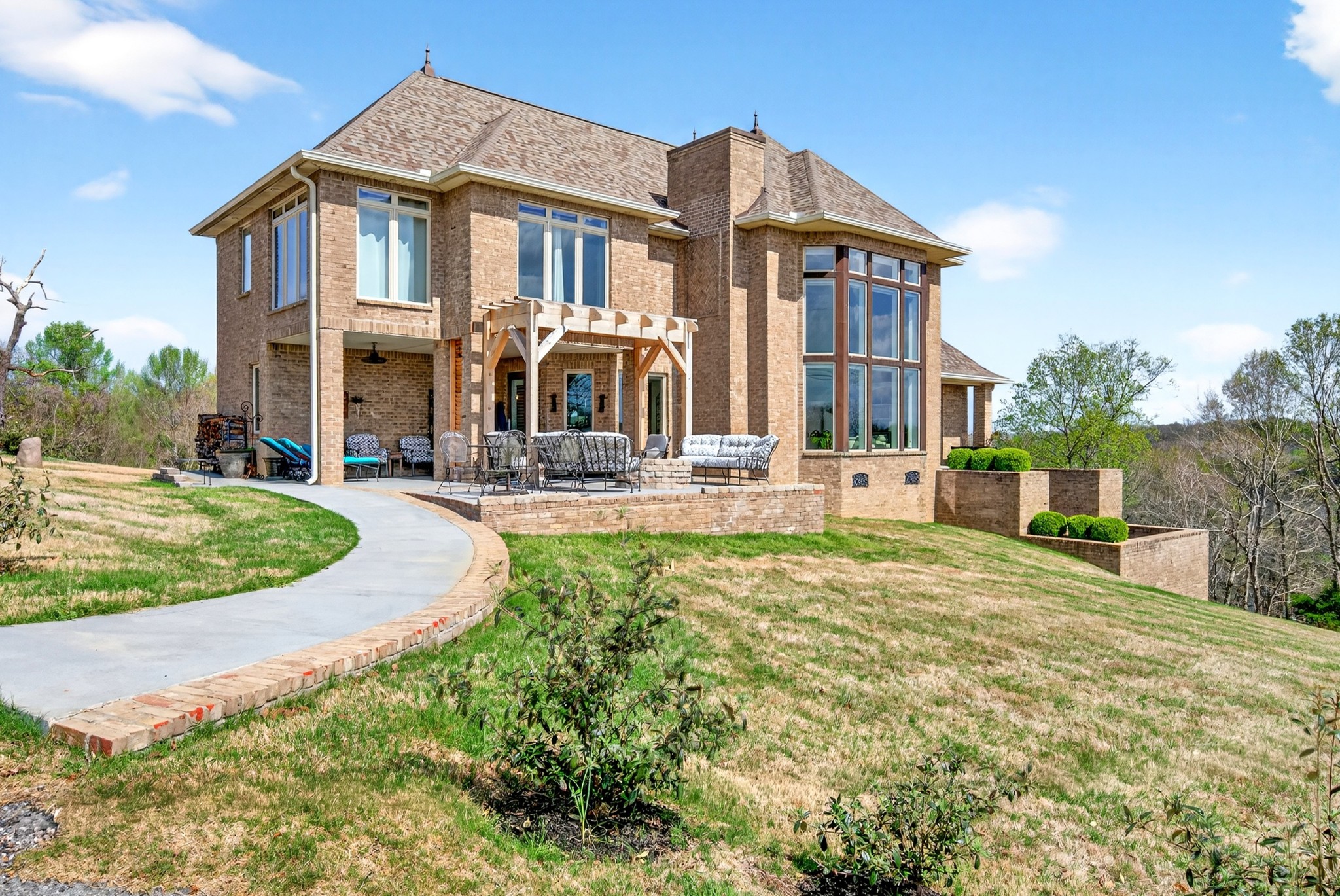 a front view of a house with a yard
