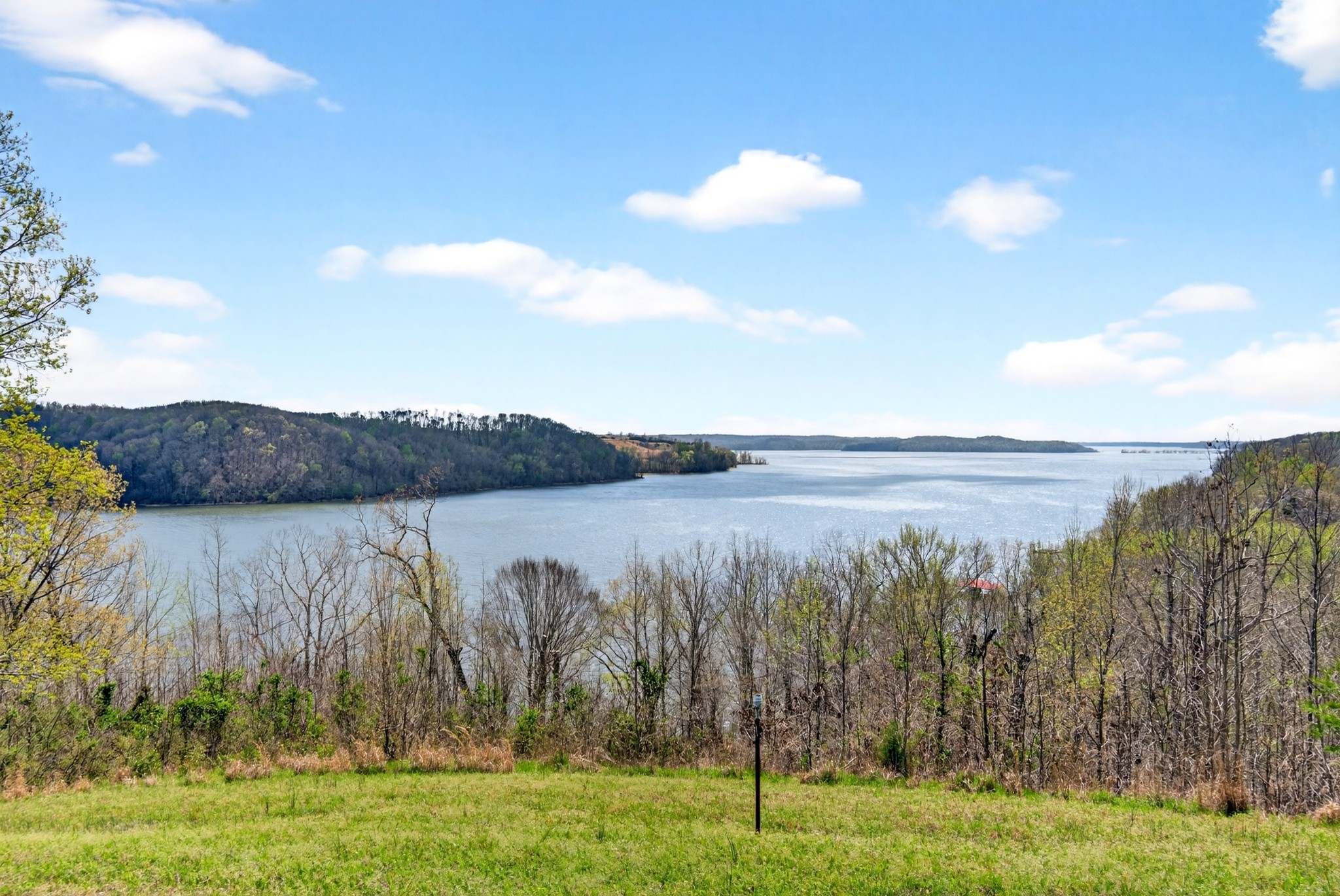501 River Trace Road Dover, TN 37058 - Photo 15 of 84 a view of a lake and mountain in the back