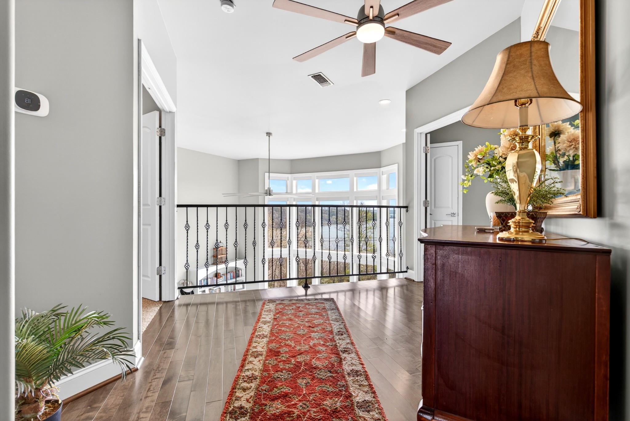 501 River Trace Road Dover, TN 37058 - Photo 39 of 84 a view of balcony with a floor to ceiling window and wooden floor