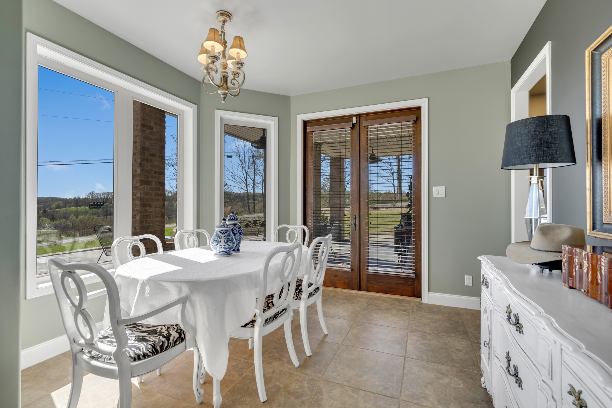 501 River Trace Road Dover, TN 37058 - Photo 40 of 84 a view of a dining room with furniture large windows and wooden floor
