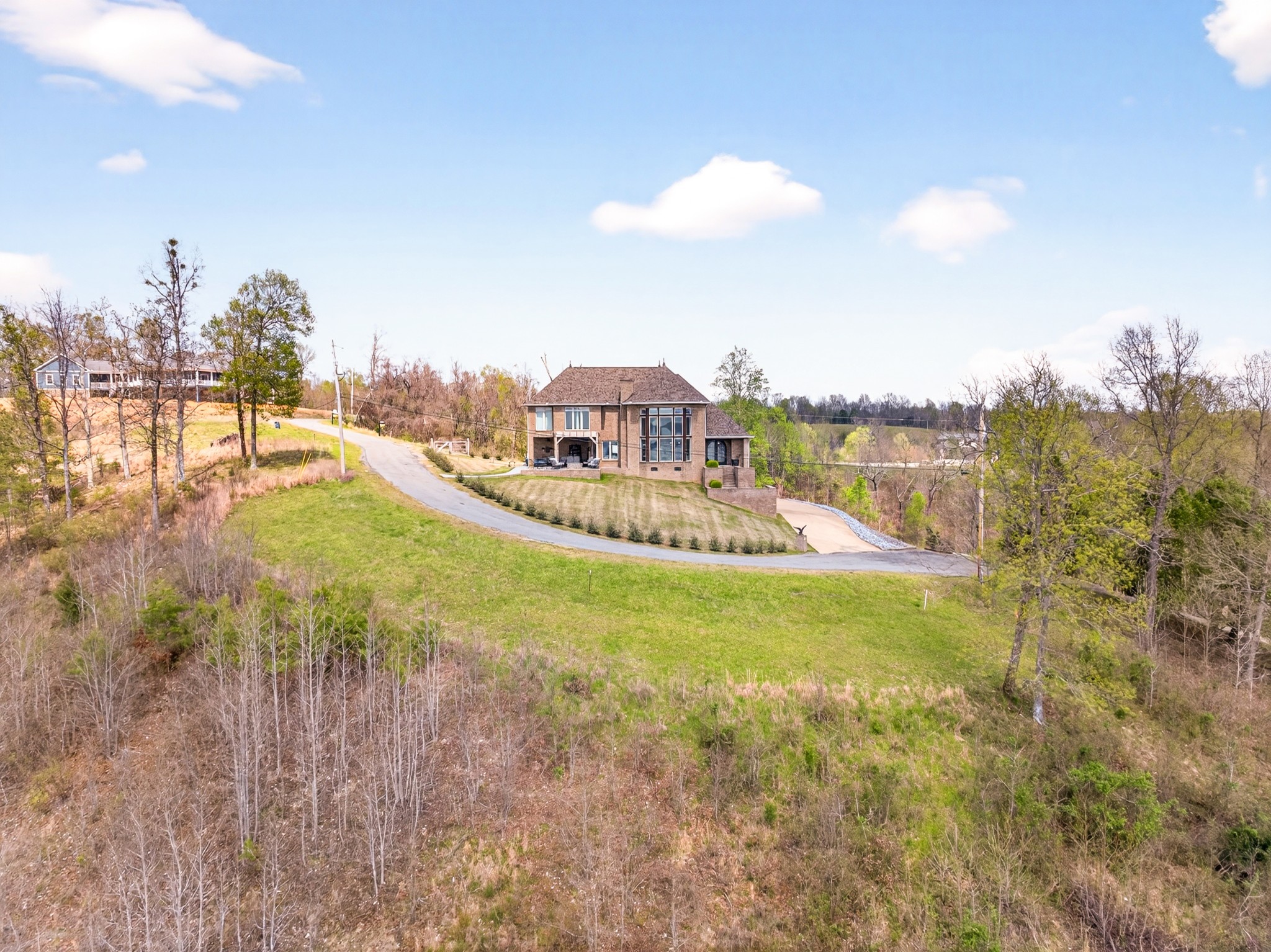501 River Trace Road Dover, TN 37058 - Photo 67 of 84 a view of a house with a yard and sitting area