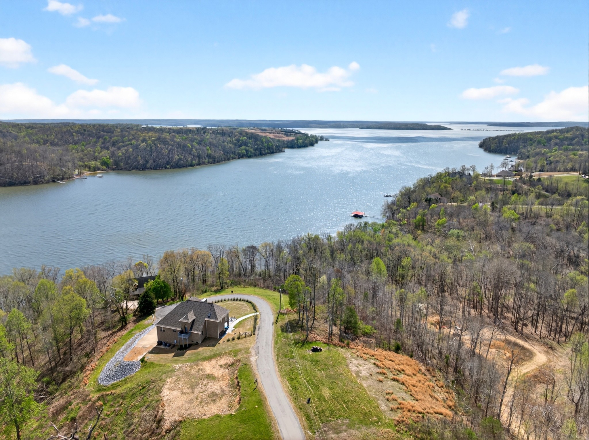 501 River Trace Road Dover, TN 37058 - Photo 79 of 84 a view of a lake with a yard