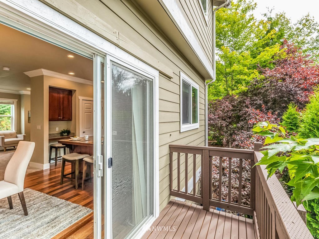 2019 Northeast 9th Court, Unit A Renton, WA 98056 - Photo 22 of 26 a view of a house with backyard and sitting area