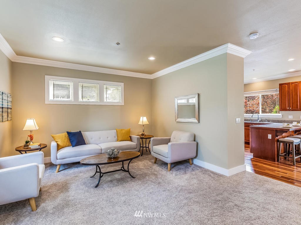2019 Northeast 9th Court, Unit A Renton, WA 98056 - Photo 6 of 26 a living room with furniture and wooden floor